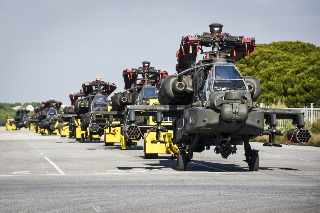 Naval Station Rota, Spain, Naval Supply Systems Command Fleet Logistics Center Sigonella, 1st Armored Division, and 1109th Theater Aviation Sustainment Maintenance Group, transport multiple AH-64D Apache helicopters Jan. 3, 2019, during helicopter intermodal operations. (MC1 Benjamin A. Lewis/Navy)
