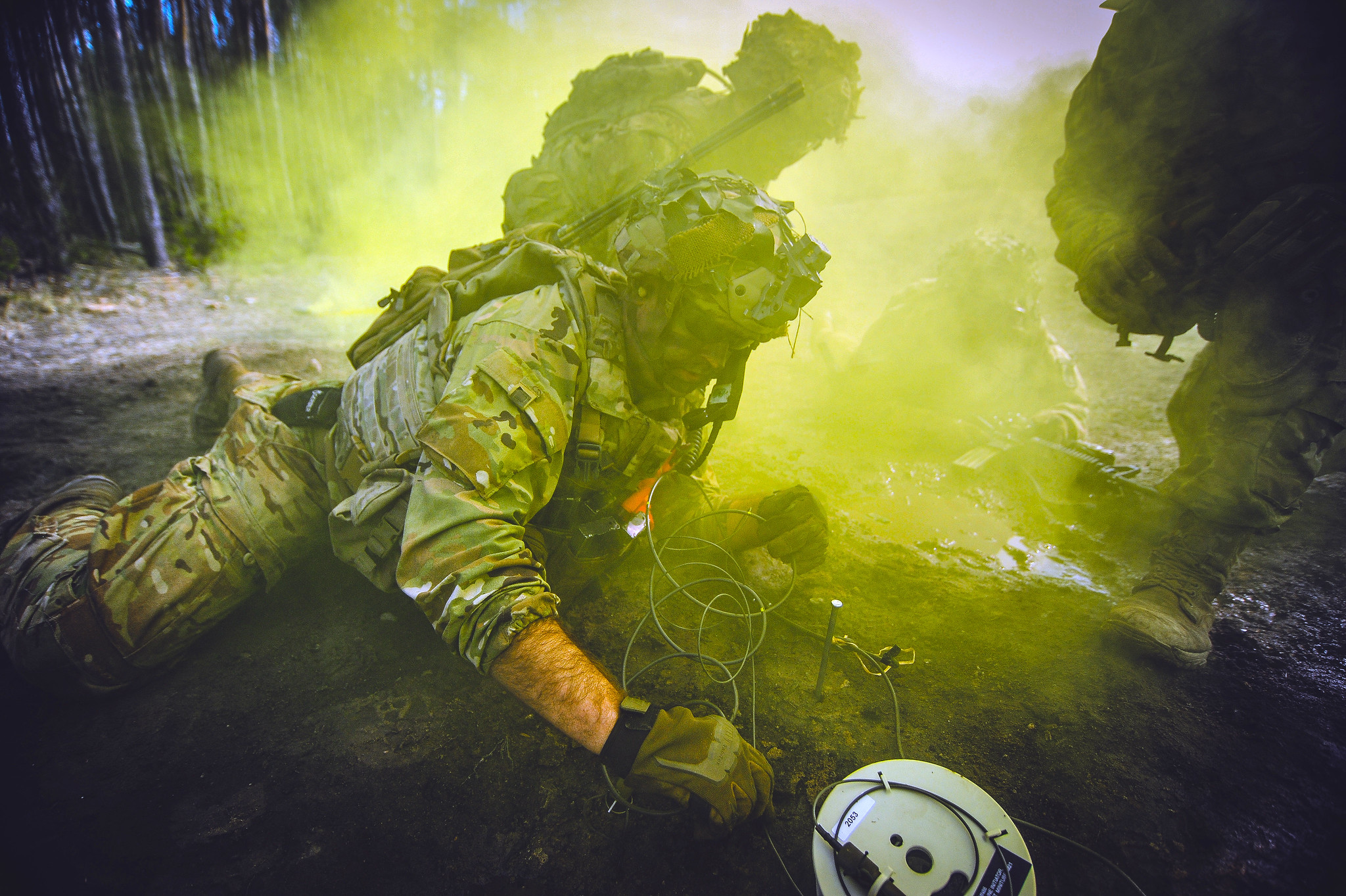 An Army paratrooper emplaces a braizer charge during Exercise Rock Spring 19 at Grafenwoehr Training Area, Germany, on March 6, 2019. (Army)