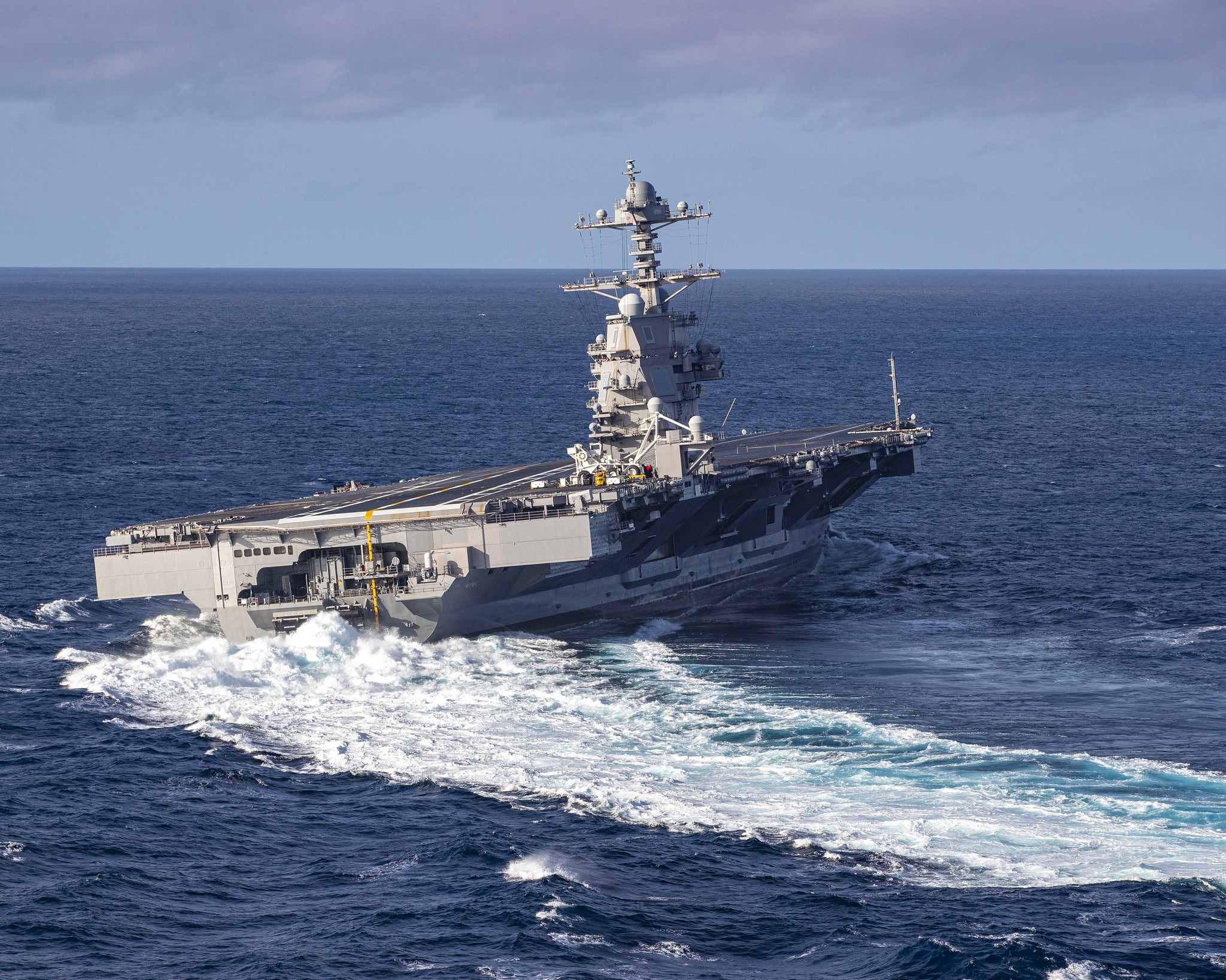 The aircraft carrier USS Gerald R. Ford (CVN 78) conducts high-speed turns in the Atlantic Ocean, Oct. 29, 2019. Gerald R. Ford is at sea conducting sea trials following the in port portion of its 15-month post-shakedown availability. (Mass Communication Specialist 3rd Class Connor Loessin/Navy)