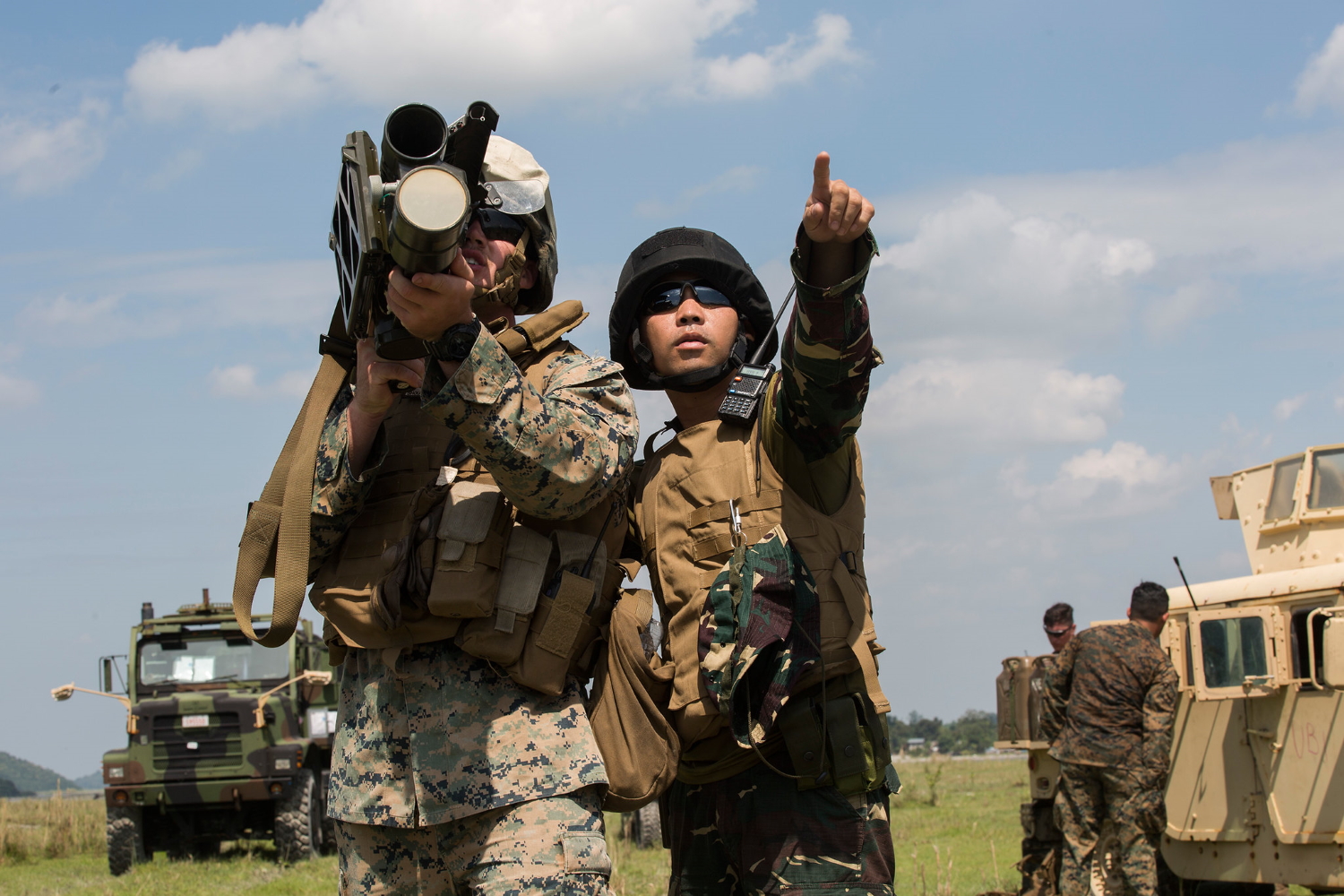 Philippine Airman 2nd Class Carlos P. Elamparo acts as a gunner for U.S. Marine Lance Cpl. Callen Shouse during a surface-to-air missile simulation as part of exercise KAMANDAG 3 at Colonel Ernesto P. Ravina Air Base, Philippines, Oct. 10, 2019. (Lance Cpl. Brienna Tuck/Marine Corps)