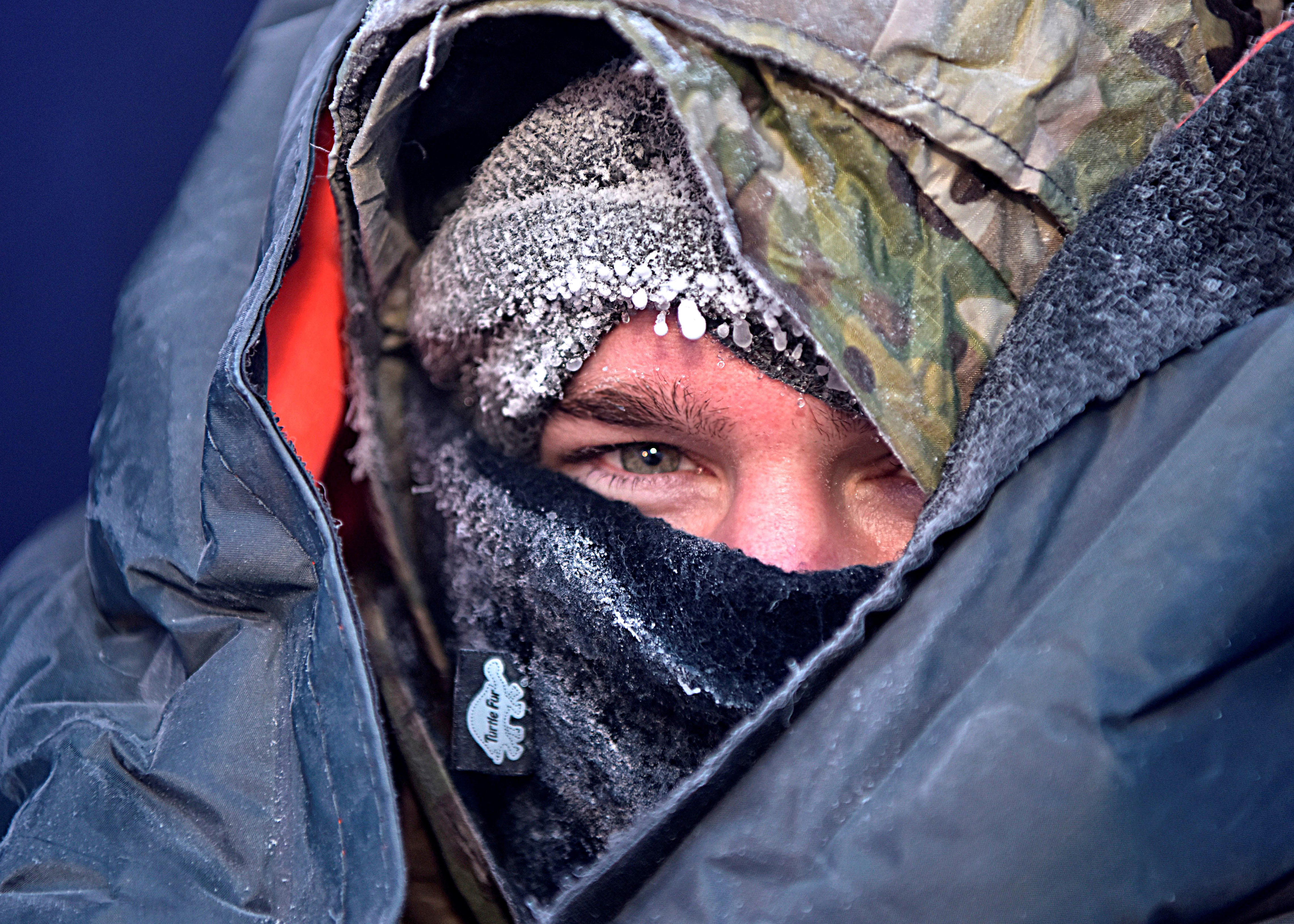 Staff Sgt. Zachary Rumke, 66th Training Squadron Detachment 1 Arctic Survival School instructor, tests an F-35A Lightning II survival-gear kit in Fairbanks, Alaska, Nov. 5, 2019. Rumke sat in minus 65 degree temperatures for six hours to test the new gear that could be used to protect F-35 pilots from subzero temperatures in the event of an ejection. (Senior Airman Beaux Hebert/Air Force)