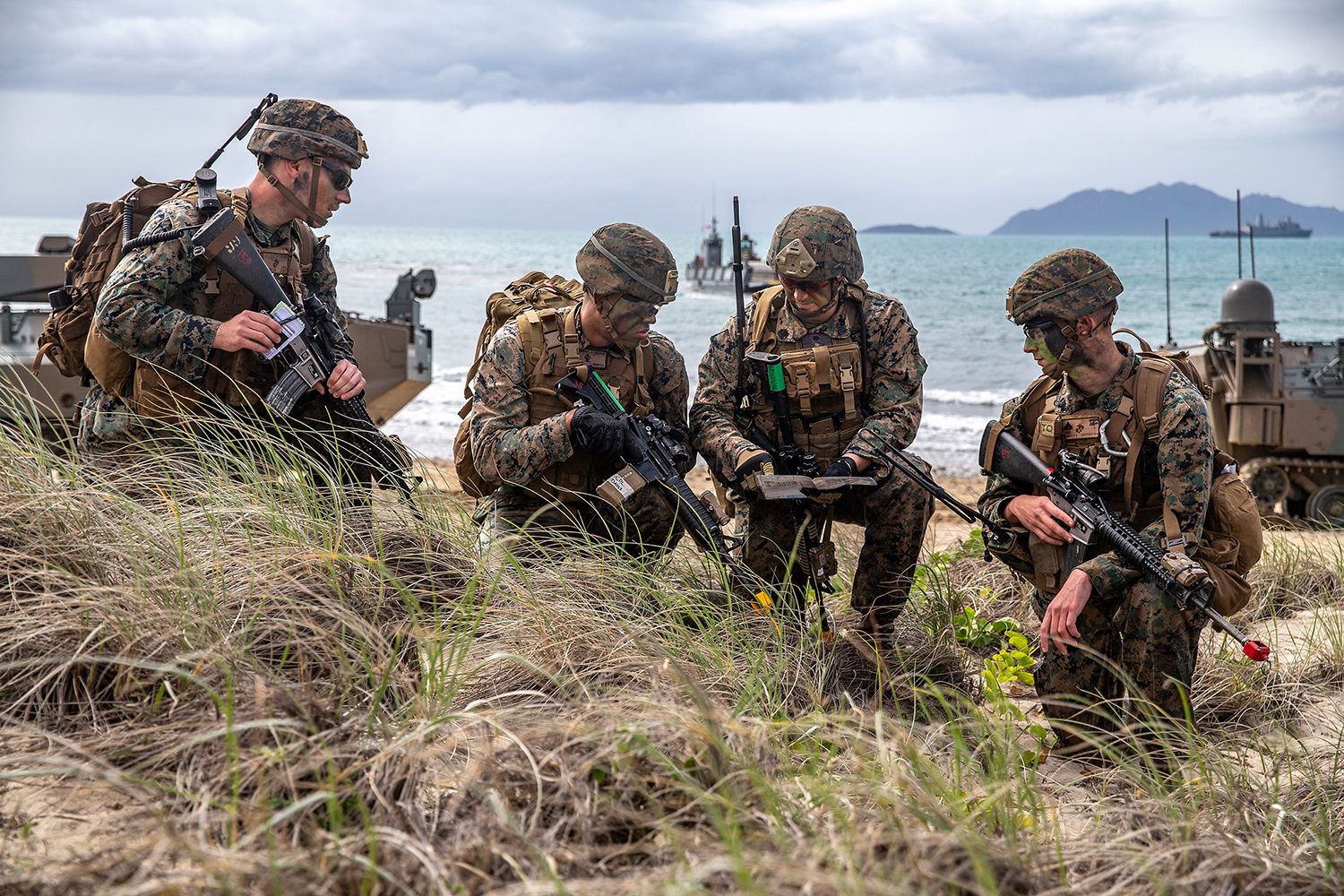 U.S. Marines assess a terrain map during a simulated amphibious assault of exercise Talisman Sabre 19 in Bowen, Australia, July 22, 2019. (Lance Cpl. Tanner D. Lambert/Marine Corps)