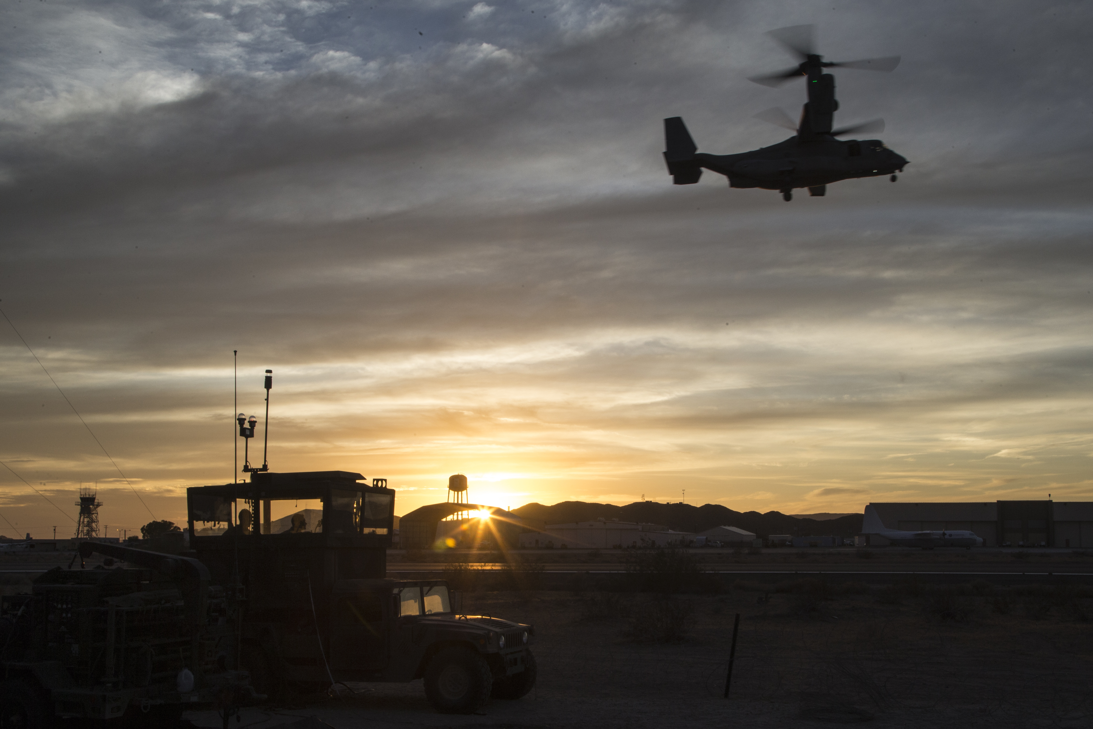 U.S. Marines assigned to Marine Aviation Weapons and Tactics Squadron One ensure safe runways for MV-22 Ospreys to land on during Weapons and Tactics Instructor Course (WTI) 1-18 at Yuma Proving Grounds, Ariz.. WTI is a seven-week training event hosted by MAWTS-1 cadre. (Sgt. Allison Lotz/Marine Corps)