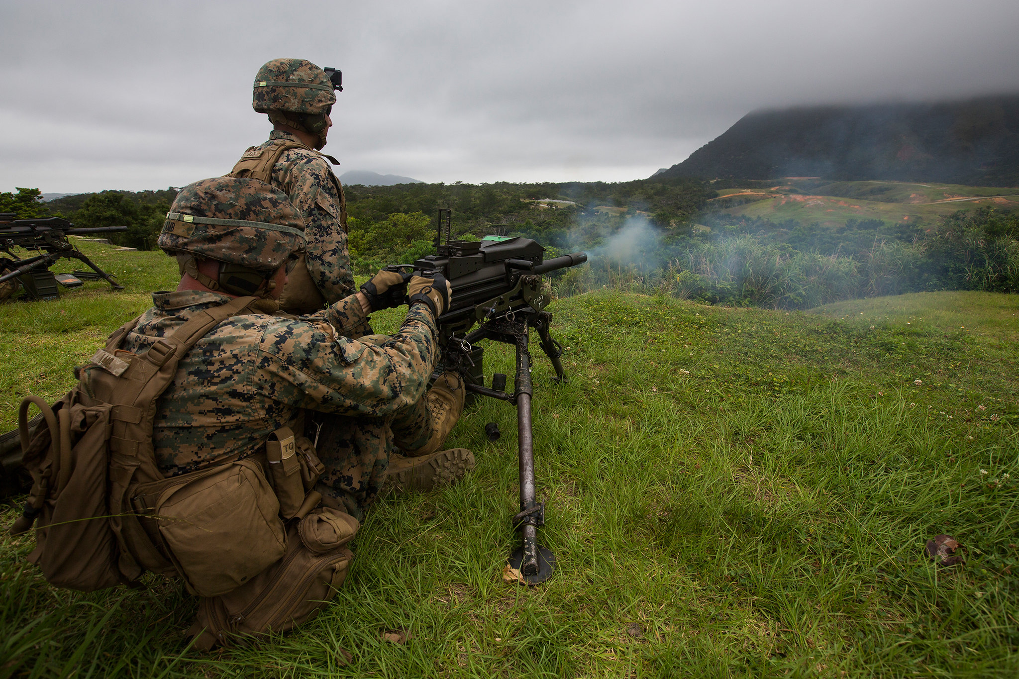 Marines fire a Mark 19 automatic grenade launcher during training at Camp Schwab, Okinawa, Japan, May 28, 2019. (Lance Cpl. Cameron E. Parks/Marine Corps)