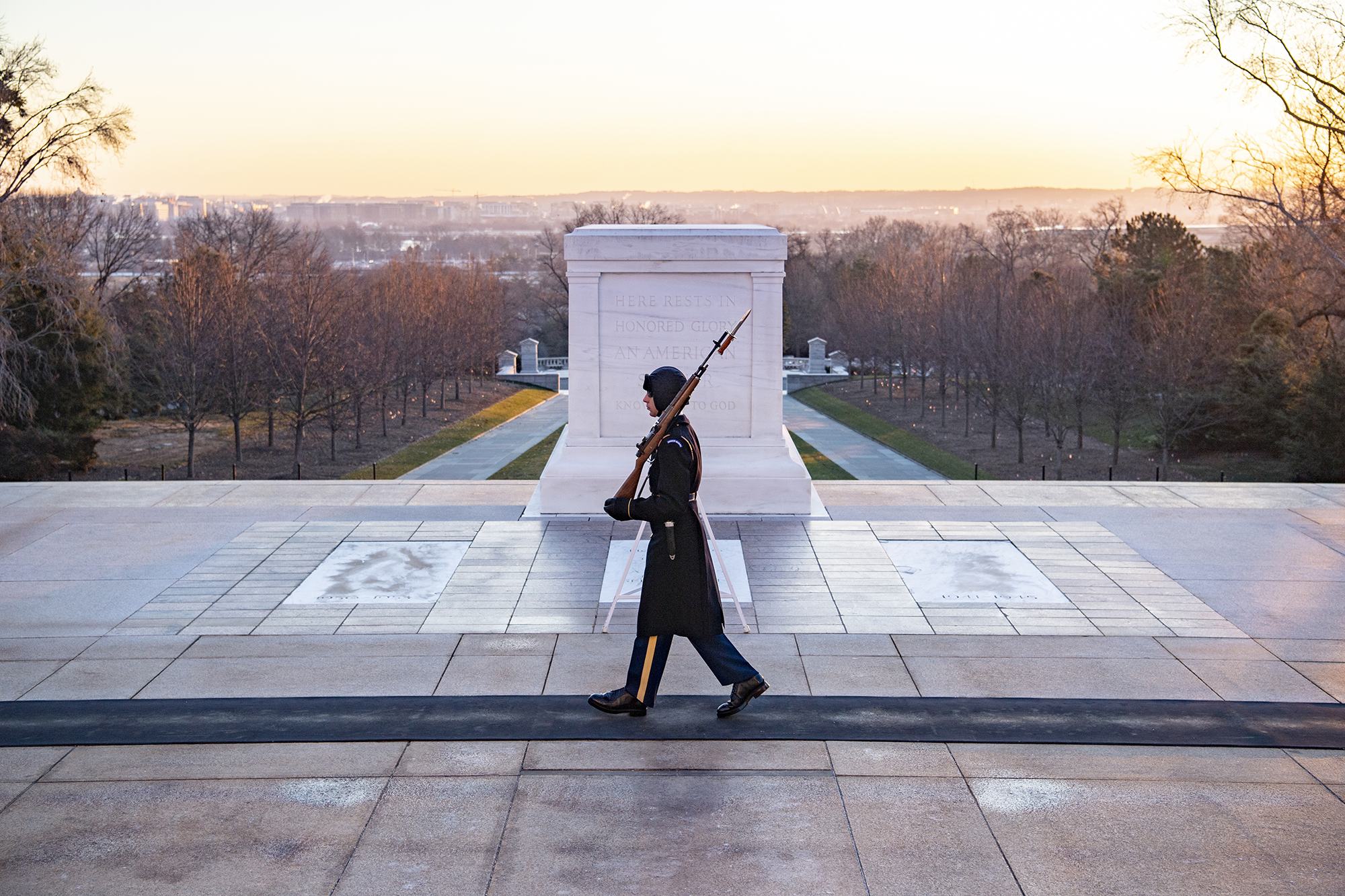 A tomb sentinel walks the mat at the Tomb of the Unknown Soldier early in the morning at Arlington National Cemetery, Arlington, Va., Jan. 22, 2020. (Elizabeth Fraser/Arlington National Cemetery)