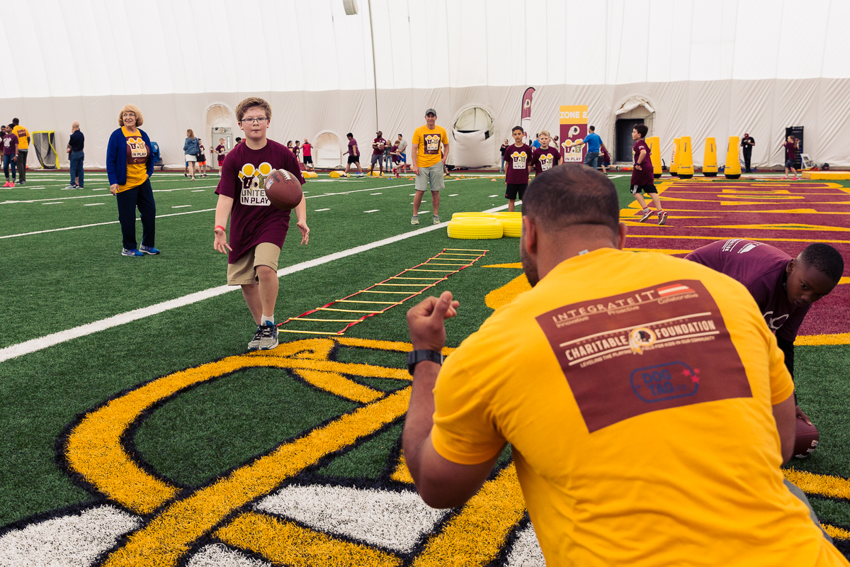 Military children participate in team-building activities for Army Forces Day on Saturday, June 19, 2018, at Redskins Park in Loudoun County, Va. (James Williams/Military Times)