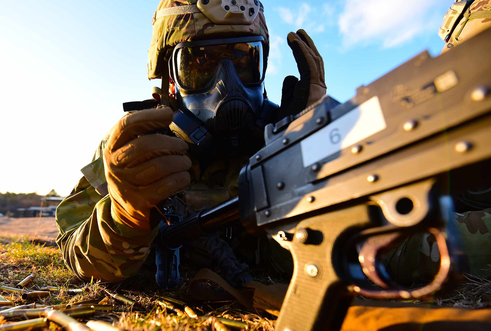 A U.S. Army paratrooper assigned to the 173rd Brigade Support Battalion, 173rd Airborne Brigade, fits his M50 gas mask during a live-fire exercise as part of Lipizzaner VI at Bac Range in Postojna, Slovenia, Jan. 29, 2020. (Paolo Bovo/Army)