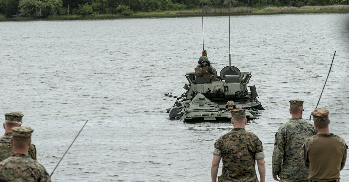 U.S. Marines with 2nd Light Armored Reconnaissance Battalion, 2nd Marine Division conduct a float test in Light Armored Vehicles during water obstacle negotiation training at Camp Lejeune, N.C., May 17, 2018. The event enhanced the Marines' abilities to maneuver through aquatic terrain in LAVs in preparation for potential real-world combat scenarios. (Pfc. Tyler M. Solak/Marines)