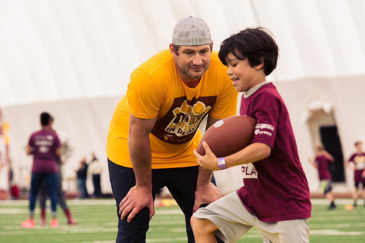 Military children participate in team-building activities for Army Forces Day on Saturday, June 19, 2018, at Redskins Park in Loudoun County, Va. (James Williams/Military Times)