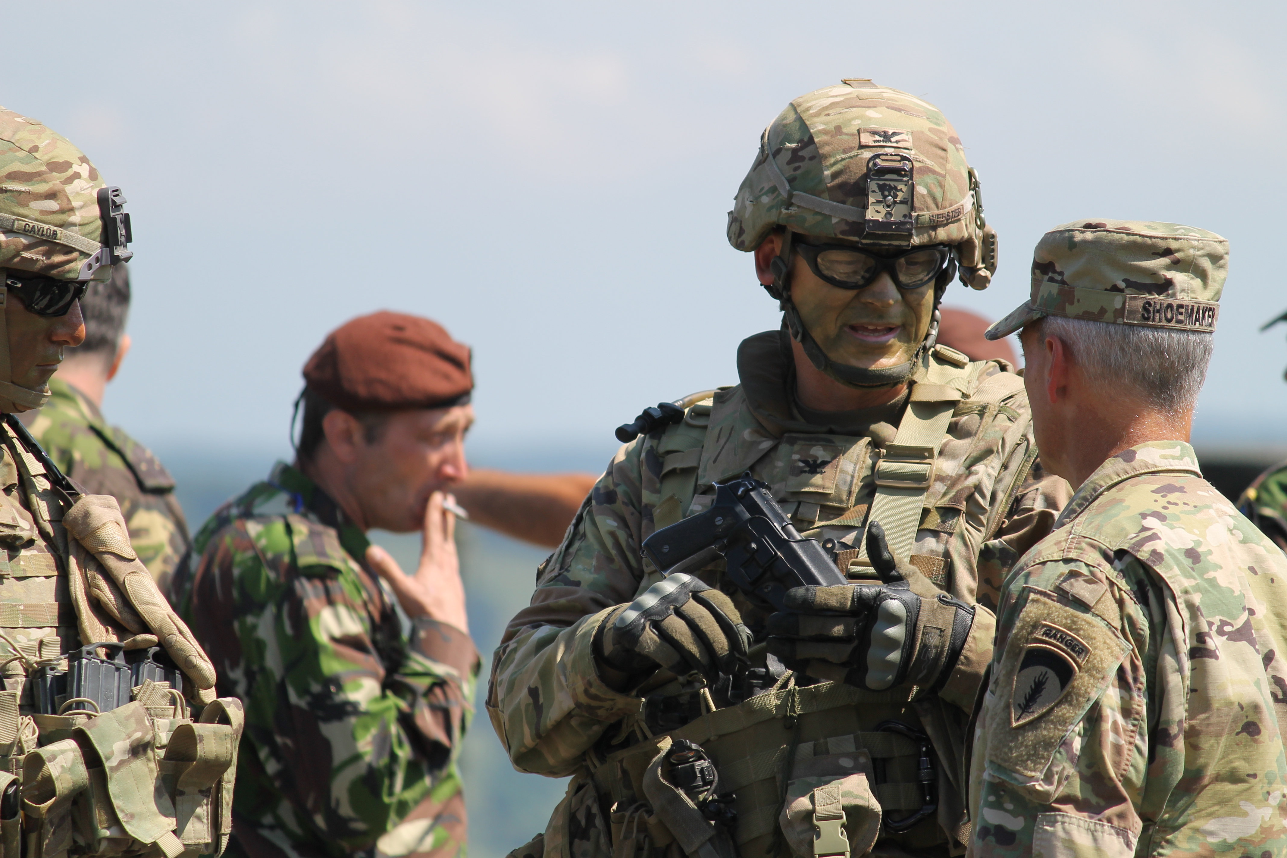 Col. Kelly Webster, the commander of the 1st Cavalry Division Artillery/DIVARTY out of Fort Hood, Texas, and Col. Jeff Shoemaker, director of U.S. Army Europe’s exercise program, discuss plans at the range where Saber Guardian’s Combined-Arms Live-Fire Exercise, or CALFEX, would take place on July 15. Webster’s division was in charge of mission command for the exercise with the goal of suppressing enemy air-defense and artillery assets to provide room for friendly maneuver forces to advance. His Tactical Operating Command was nestled along the treeline at the top of the range located on a hill, but was moved every few days to teach mobility — an important tactic expected to be employed when operating against near-peer adversaries. (Jen Judson/Staff)
