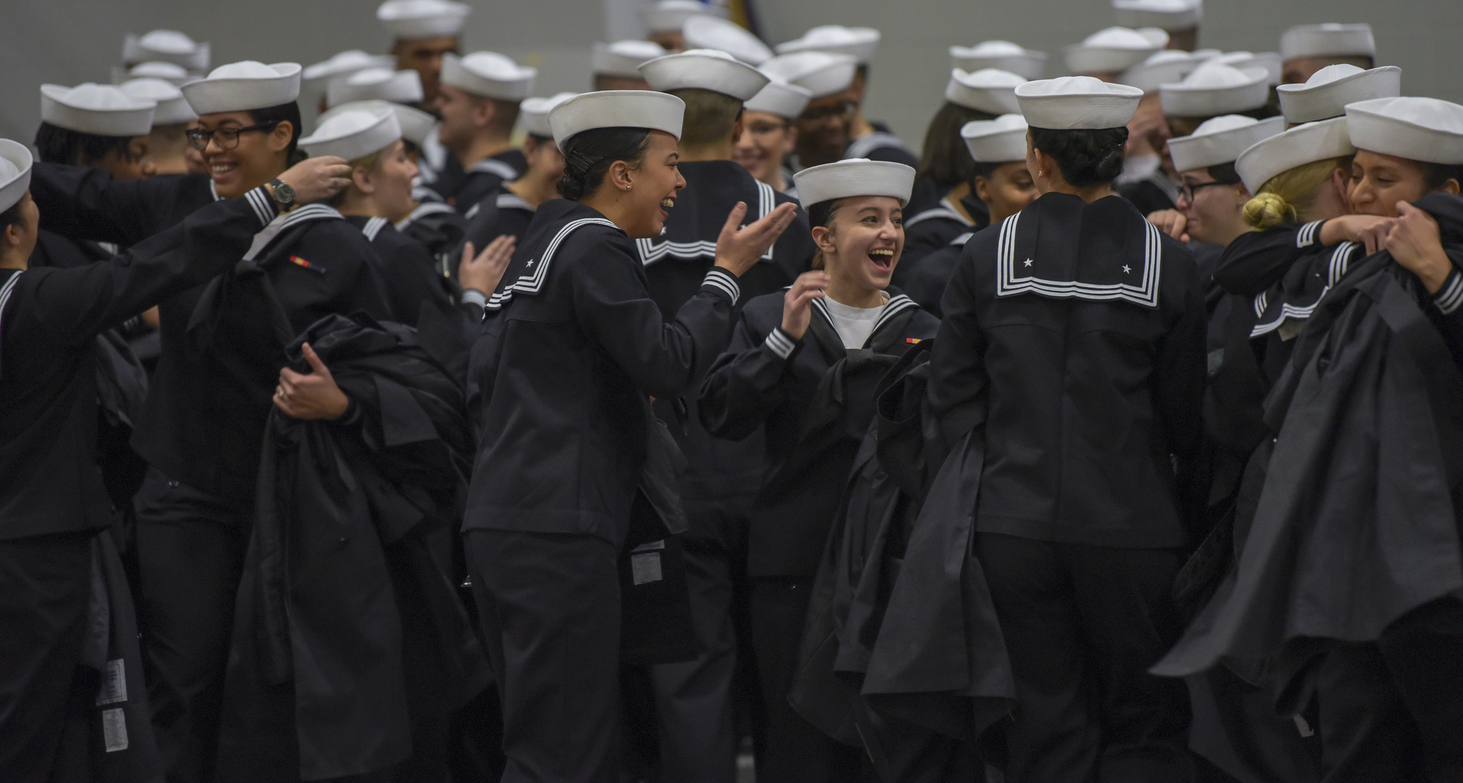 Sailors celebrate after graduating from Recruit Training Command on Jan. 4, 2019, at Great Lakes, Ill. More than 30,000 recruits graduate annually from the Navy's only boot camp. (MC1 Spencer Fling/Navy)