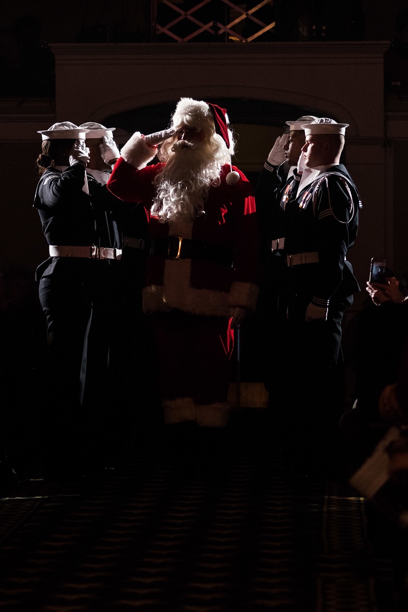 Santa Claus arrives at the United States Navy Band's annual holiday concert Dec. 17, 2017, at DAR Constitutional Hall in Washington. (Musician 1st Class Jonathan Barnes/Navy)
