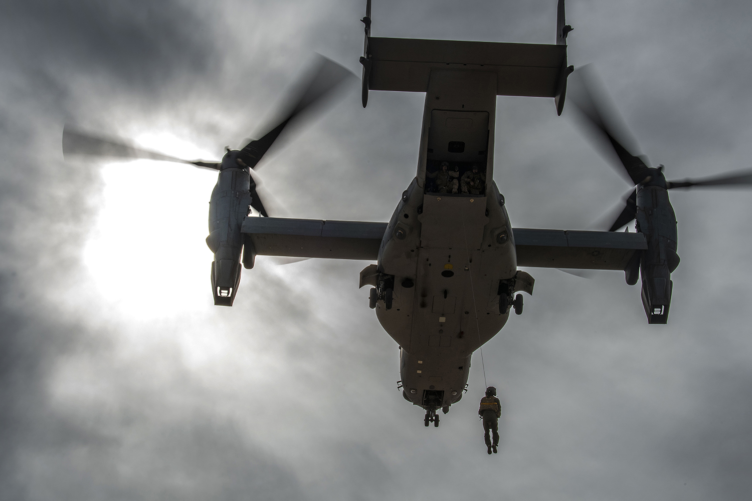 A CV-22 Osprey, assigned to the 20th Special Operations Squadron, hoists up a simulated survivor during combat search and rescue training at Cannon Air Force Base, N.M., March 7, 2019. (Staff Sgt. Luke Kitterman/Air Force)
