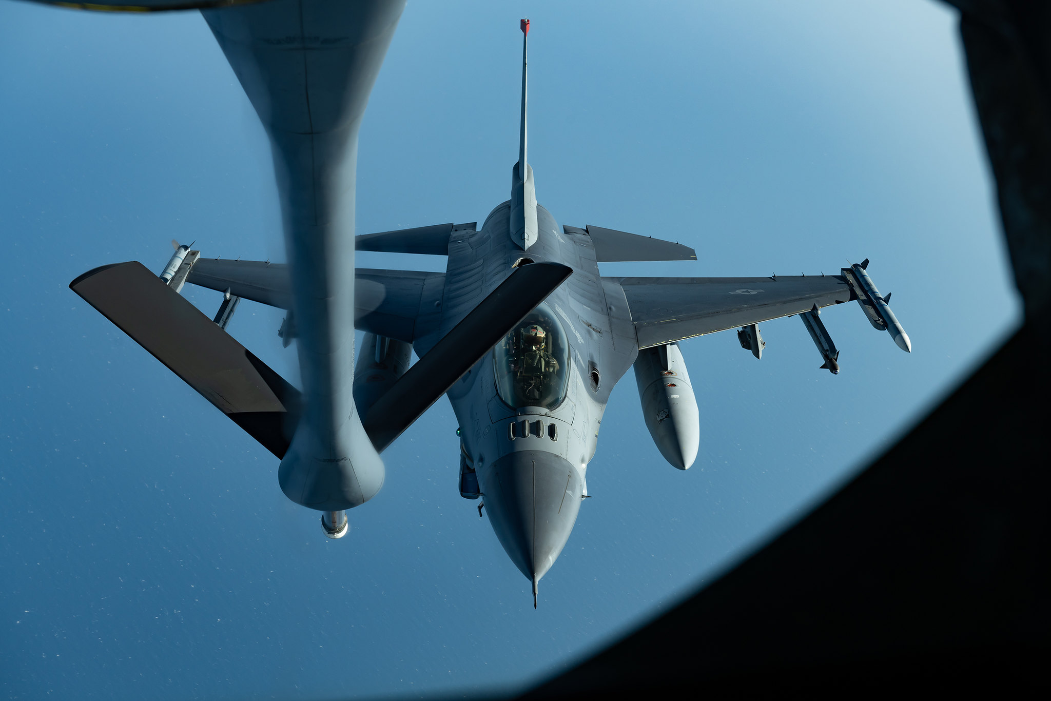 An F-16CM Fighting Falcon prepares to refuel with a KC-135 Stratotanker during a routine training exercise off the coast of Japan, May 8, 2019. (Airman 1st Class Matthew Seefeldt/Air Force)