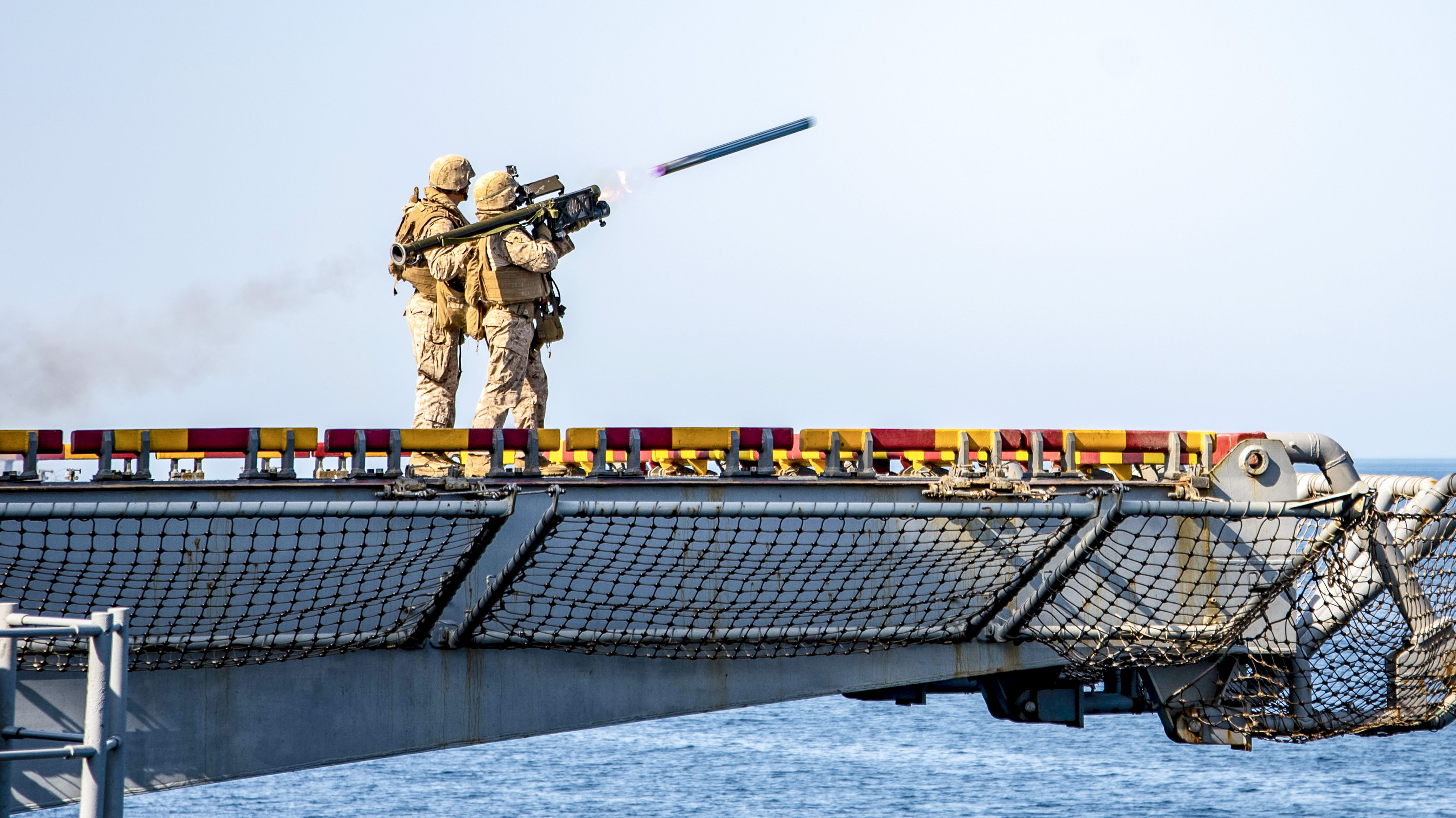 Marine Corps Sgt. Jade Woodend, assigned to Battalion Landing Team 3/1, fires a FIM-92 Stinger from the flight deck of the Wasp-class amphibious assault ship USS Essex (LHD 2) during a scheduled deployment with the Essex Amphibious Ready Group (ARG) and 13th Marine Expeditionary Unit (MEU). (MC3 Jenna Dobson/Navy)