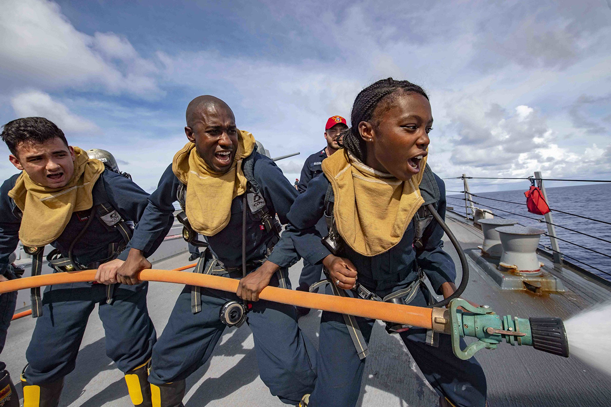 Sailors practice proper firefighting techniques during a damage control training drill June 26, 2019, aboard the Arleigh Burke-class guided-missile destroyer USS McCampbell (DDG 85) in the Philippine Sea. (Mass Communication Specialist 3rd Class Isaac Maxwell/Navy)