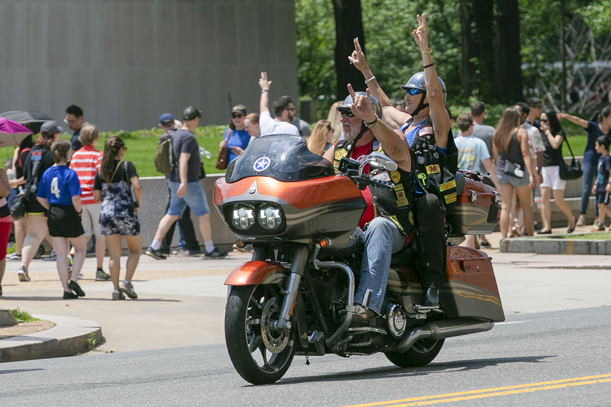 Riders wave to the large crowd during Rolling Thunder XXXI First Amendment Demonstration Run along Constitution Ave. in Washington, DC on Sunday May 27, 2018. Motorcycle riders from across the nation, rode a designated route through the Mall area of Washington, D.C. The event is an actual demonstration/protest to bring awareness and accountability for POWs and MIAs left behind.(Alan Lessig/Staff)