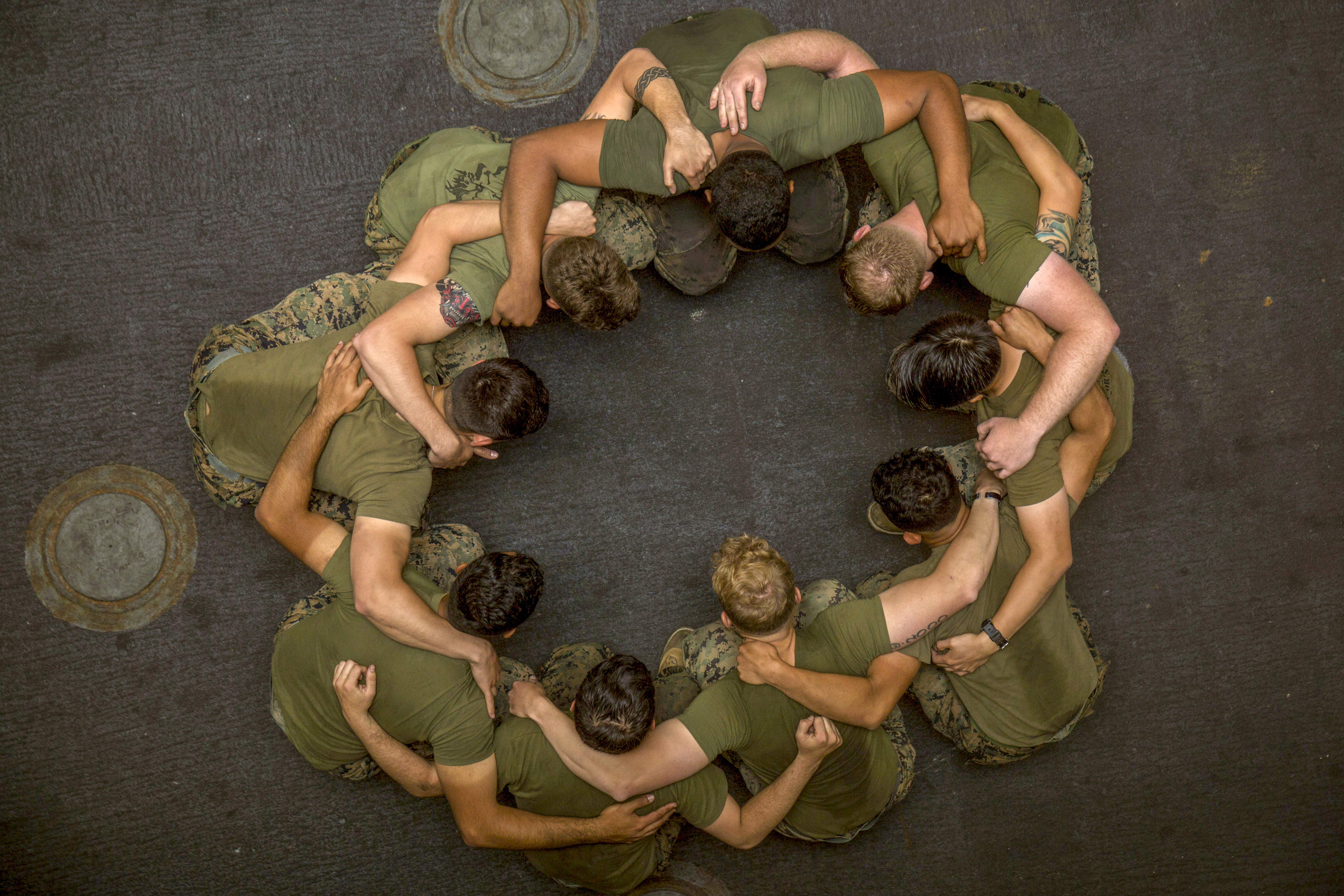 U.S. Marines with Combat Logistics Battalion 13, 13th Marine Expeditionary Unit, participate in a Marine Corps Martial Arts Program class aboard the San-Antonio class amphibious transport dock ship USS Anchorage (LPD 23), April 28, 2018.The Essex Amphibious Ready Group (ARG) and 13th MEU integrated to conduct the second major exercise of their pre-deployment training. ARG, MEU Exercise (ARGMEUEX) provides essential and realistic ship-to-shore training, designed to enhance the integration of the Navy-Marine Corps team. ARGMEUEX provides an opportunity to integrate unique individual and unit skills and develop the Essex ARG and 13th MEU’s collective proficiency in challenging and unfamiliar environments. (Cpl. Austin Mealy/Marines)