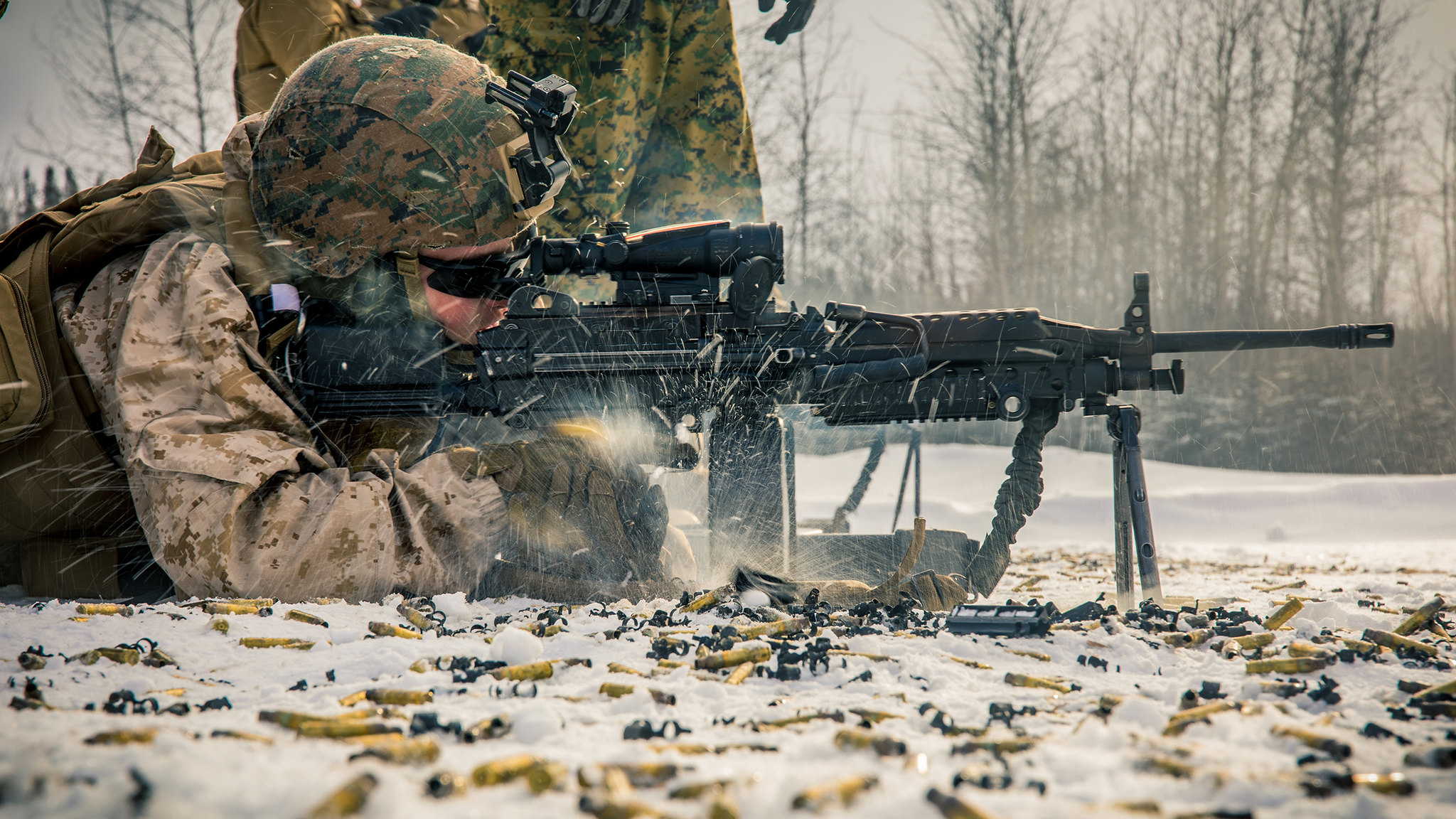 Lance Cpl. Darren J. Duhaime, a small arms repairer/technician with 5th Battalion, 11th Marine Regiment, 1st Marine Division, engages a target with an M249 light machine gun during a machine gun range at Fort Greely, Alaska, Feb. 22, 2020, in preparation for exercise Arctic Edge 2020. (Lance Cpl. Jose Gonzalez/Marine Corps)