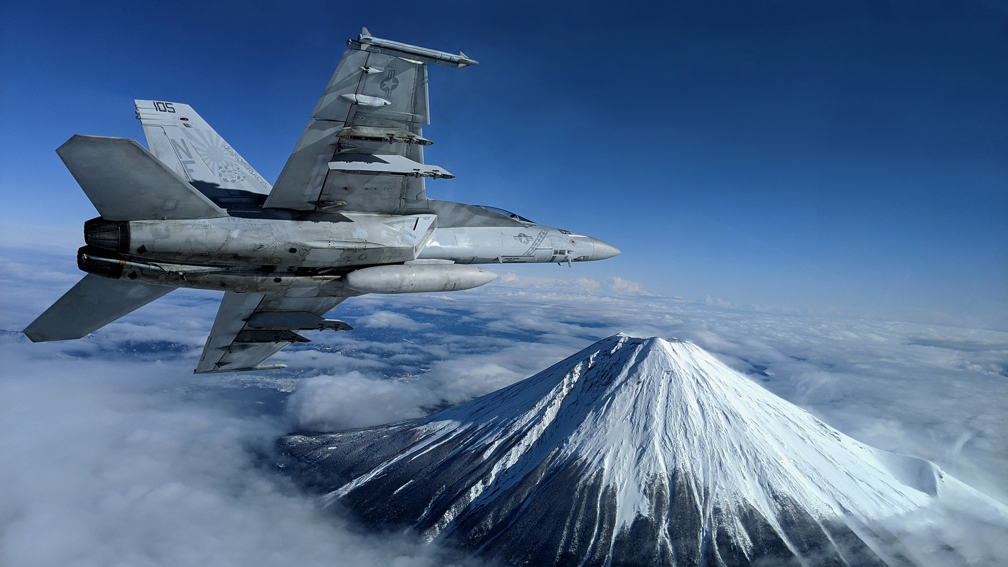 An F/A-18F Super Hornet assigned to Strike Fighter Squadron 102 conducts flight operations near Mount Fuji on Jan. 29, 2020, in Japan. (Lt. Alex Grammar/Navy)
