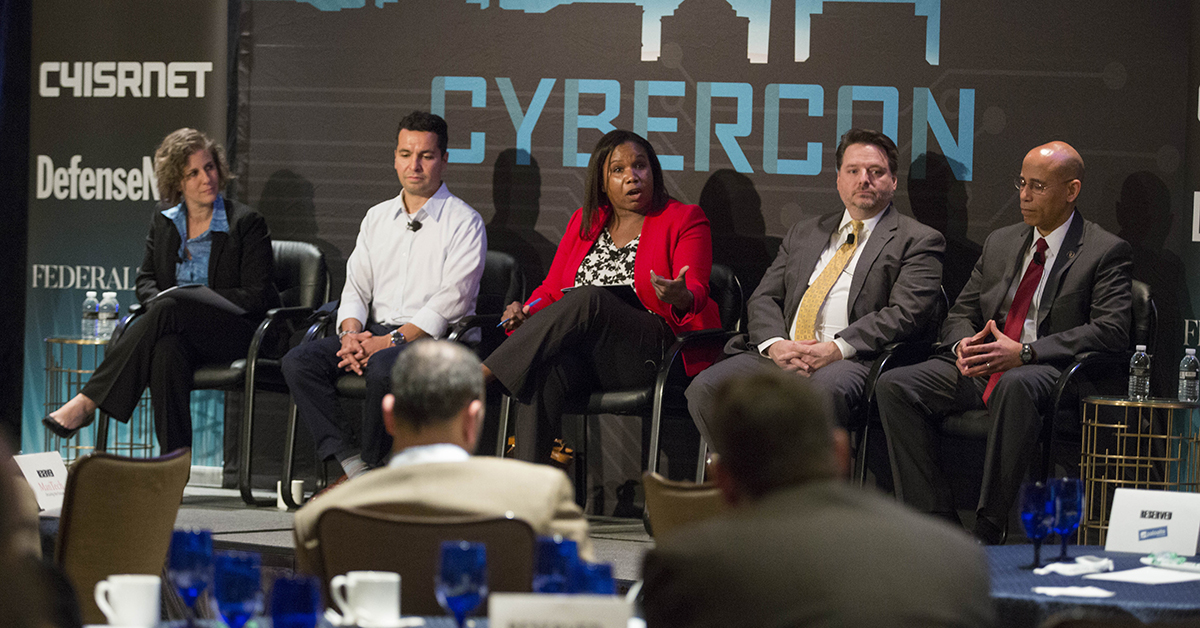 Jill Aitoro moderates a panel: Training on the Edge: with Joey Muniz, Technical Solutions Architect, Cisco, Deborah Pierre-Louis, Director of Policy, Liaison, and Training Office, Department of State, and Harry WIngo, Faculty member at College of Information and cyberspace, National Defense University at Cybercon 2017 at the Ritz-Carlton Hotel in Pentagon City on Nov. 28, 2017. ( Ben Murray/Staff)