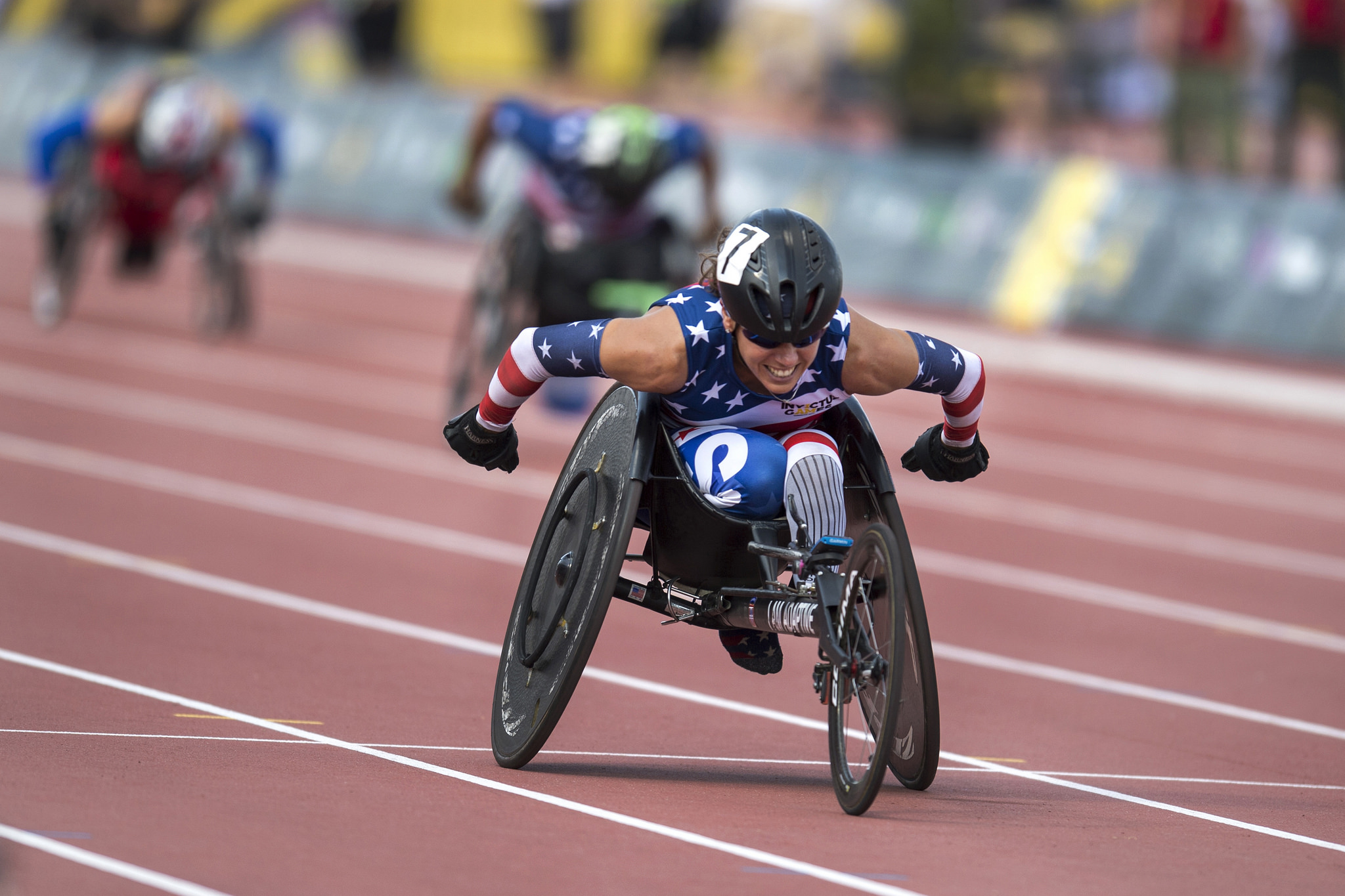U.S. Army veteran Kelly Elmlinger races a wheelchair during the 2017 Invictus Games in Toronto, Canada, on Sept. 24, 2017. The Invictus Games, established by Prince Harry in 2014, brings together wounded and injured veterans from 17 nations for 12 adaptive sporting events, including track and field, wheelchair basketball, wheelchair rugby, swimming, sitting volleyball, and, new to the 2017 games, golf. (EJ Hersom/DoD)