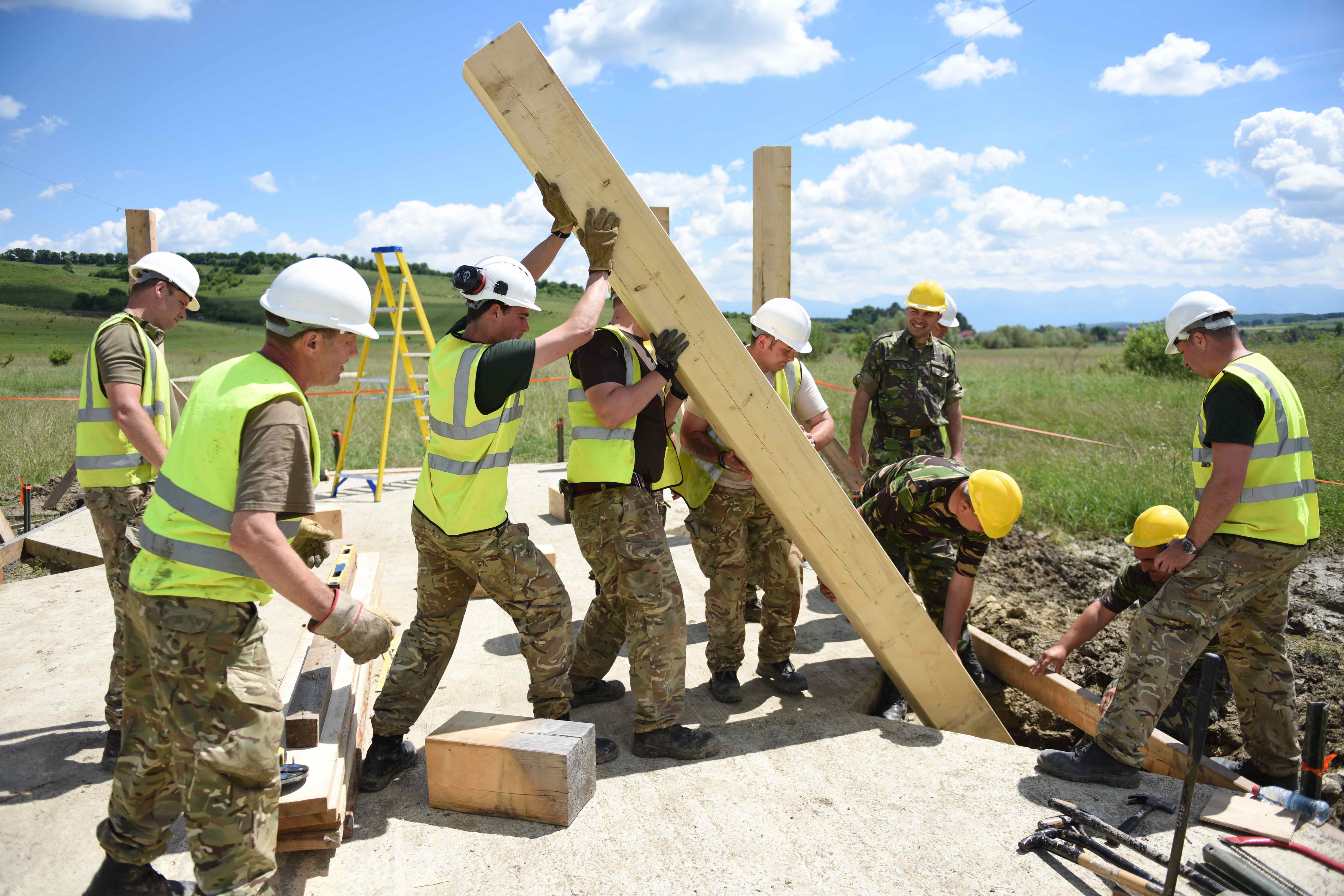 British Armed Forces and Romanian soldiers worked together to erect several buildings throughout the new training ranges, from a multipurpose shelter to a light demolition training range where soldiers can practice demolition of objects like doors and windows. Building the structures was no easy task considering the amount of rain during construction. Soldiers made fast work of sunny days. (Jen Judson/Staff)