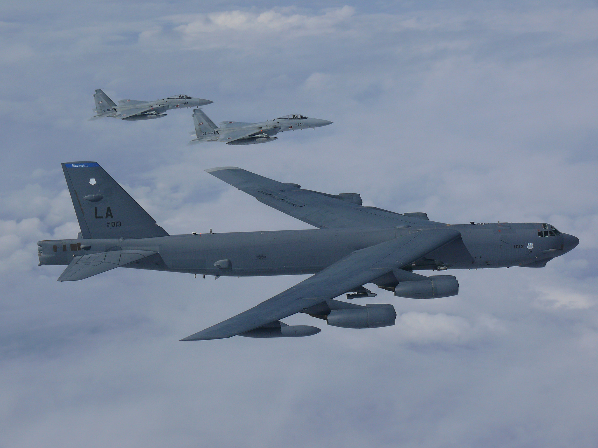 A U.S. Air Force B-52H Stratofortress bomber and two Koku Jieitai (Japan Air Self-Defense Force) F-15 fighters execute a routine bilateral training mission on Sept. 26, 2018, over the East China Sea and the Sea of Japan. This mission was flown in support of U.S. Indo-Pacific Command's continuous bomber presence operations, which are key to improving combined interoperability, tactical skills and relationships. These missions are consistent with international law and the United States' long-standing and well-known freedom of navigation policies. (USINDOPACOM)