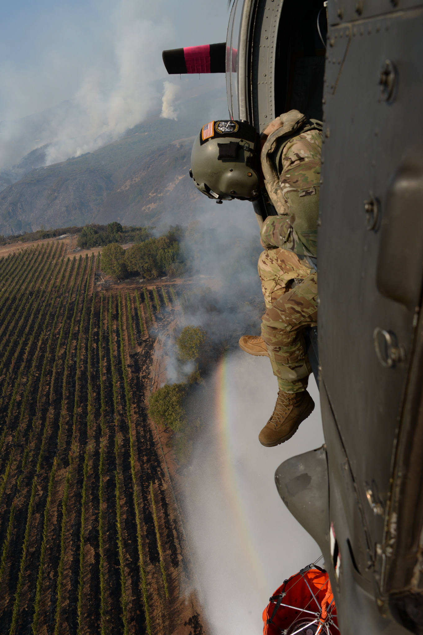 A California Army National Guard Black Hawk conducted water drops on the Northern California Fires in and around Santa Rosa on Oct. 12, 2017. As of Oct. 12, the Cal Guard had dropped more than 60,000 gallons of water on the fires across Northern California. (Master Sgt. David Loeffler/California Air National Guard)