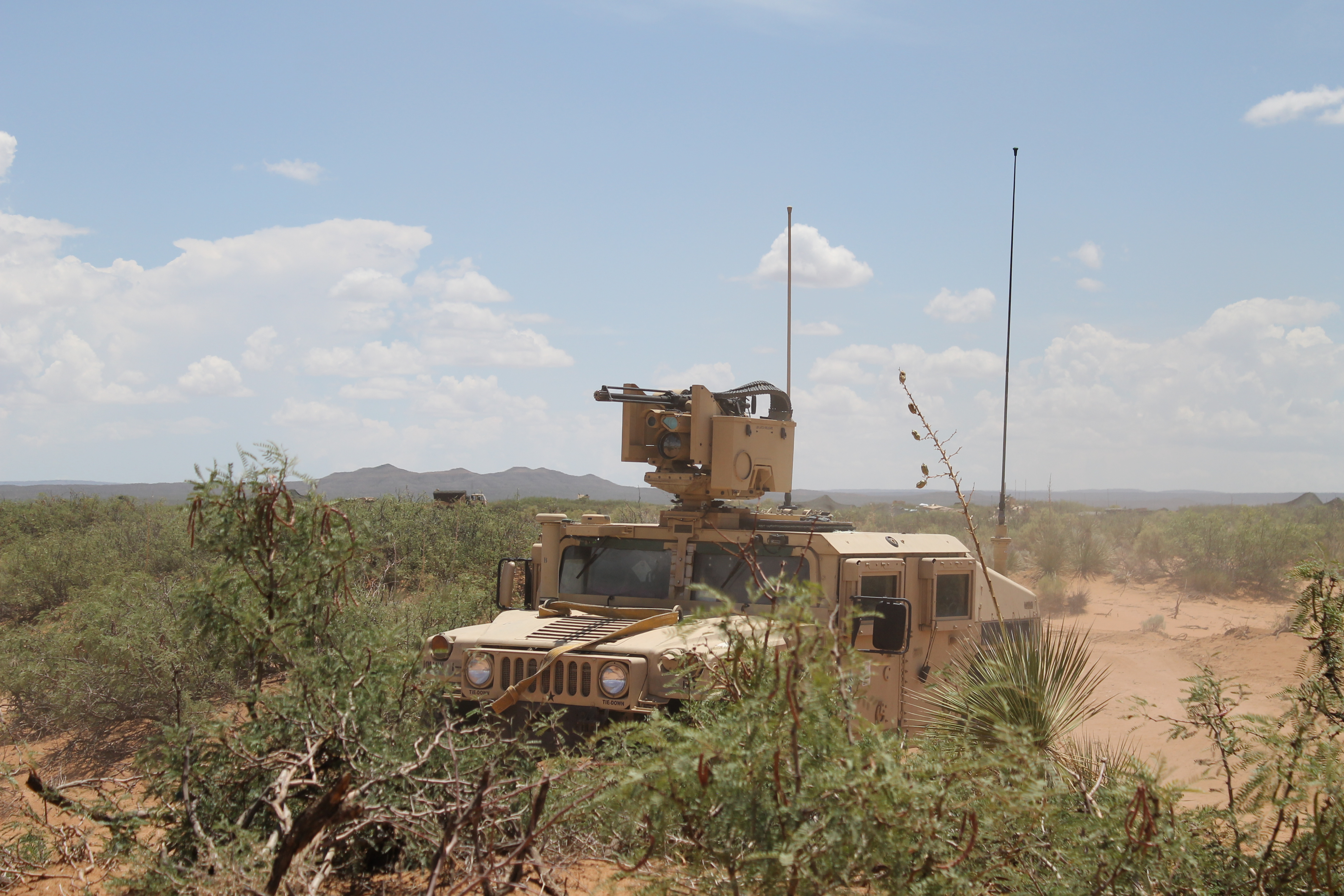 A Humvee moves position out at the NIE. Carter said he decided to put his Tactical Assault Centers (TACs) in a Humvee and move them every 15 minutes since the unit was constantly on the radio. The Humvees would be moved a few hundred meters in every direction in order to avoid location detection by the enemy, a survivability strategy in a peer and near-peer environment. (Jen Judson/Staff)