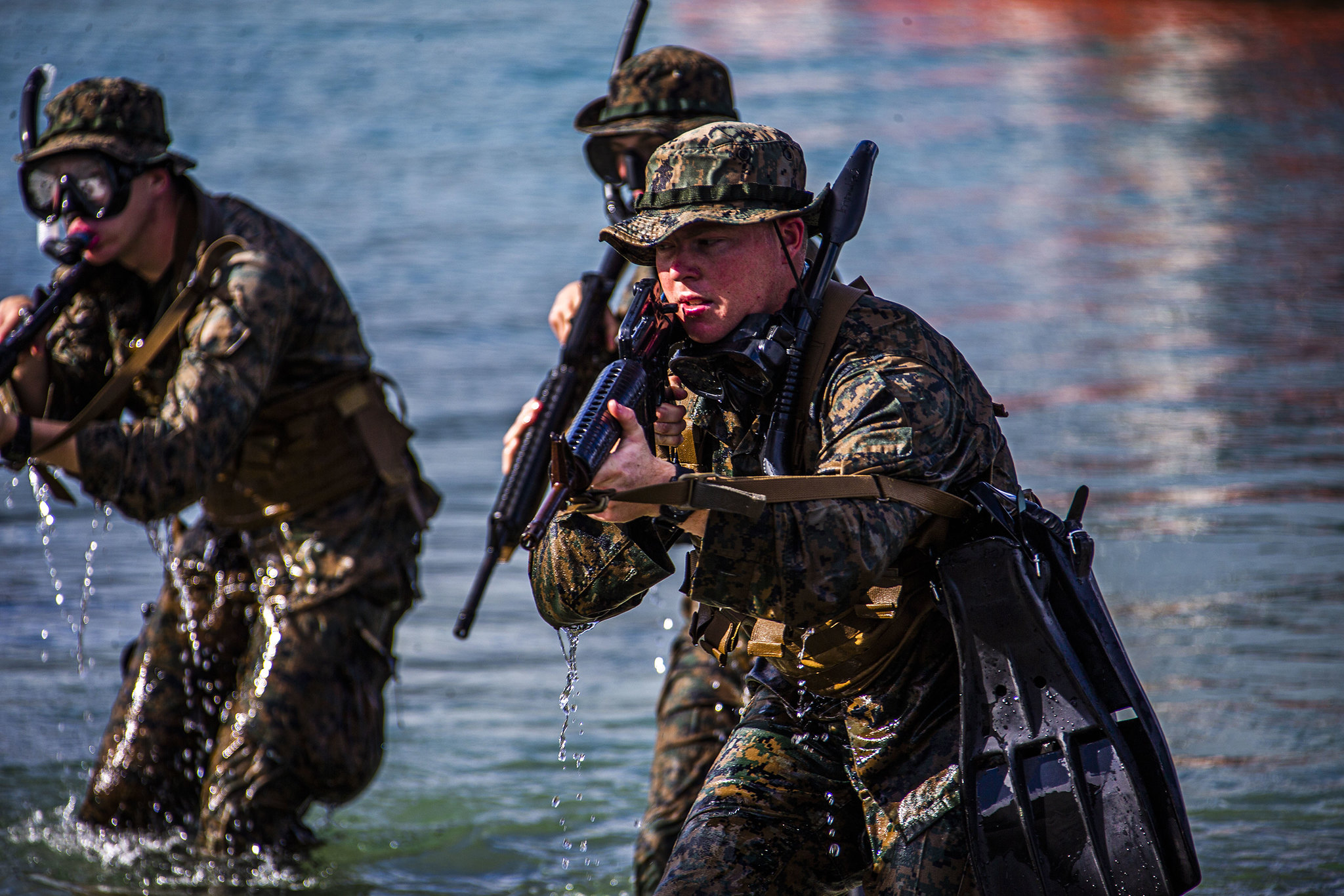 Marines hit the shore during an amphibious assault exercise on Marine Corps Base Hawaii, April 28, 2020. (Lance Cpl. Jacob Wilson/Marine Corps)