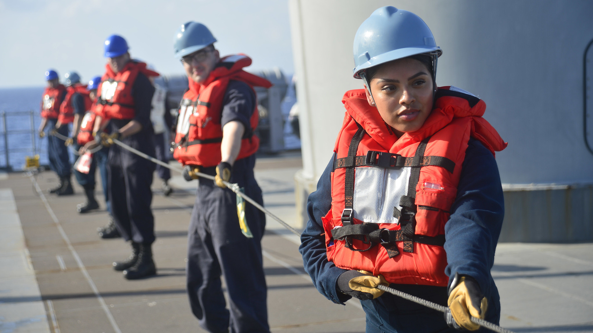 Personnel Specialist 2nd Class Elida Villalobos, from Salem, Ore., heaves around line to Fleet Replenishment Oiler USNS Guadalupe (T-AO 200) during a replenishment-at-sea with U.S. 7th Fleet Flagship USS Blue Ridge (LCC 19) in the South China Sea, March 20, 2019. (Mass Communication Specialist 3rd Class Mar'Queon A. D. Tramble/Navy)