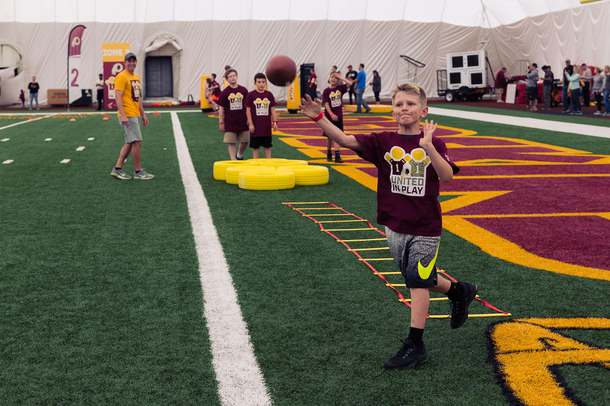 Military children participate in team-building activities for Army Forces Day on Saturday, June 19, 2018, at Redskins Park in Loudoun County, Va. (James Williams/Military Times)