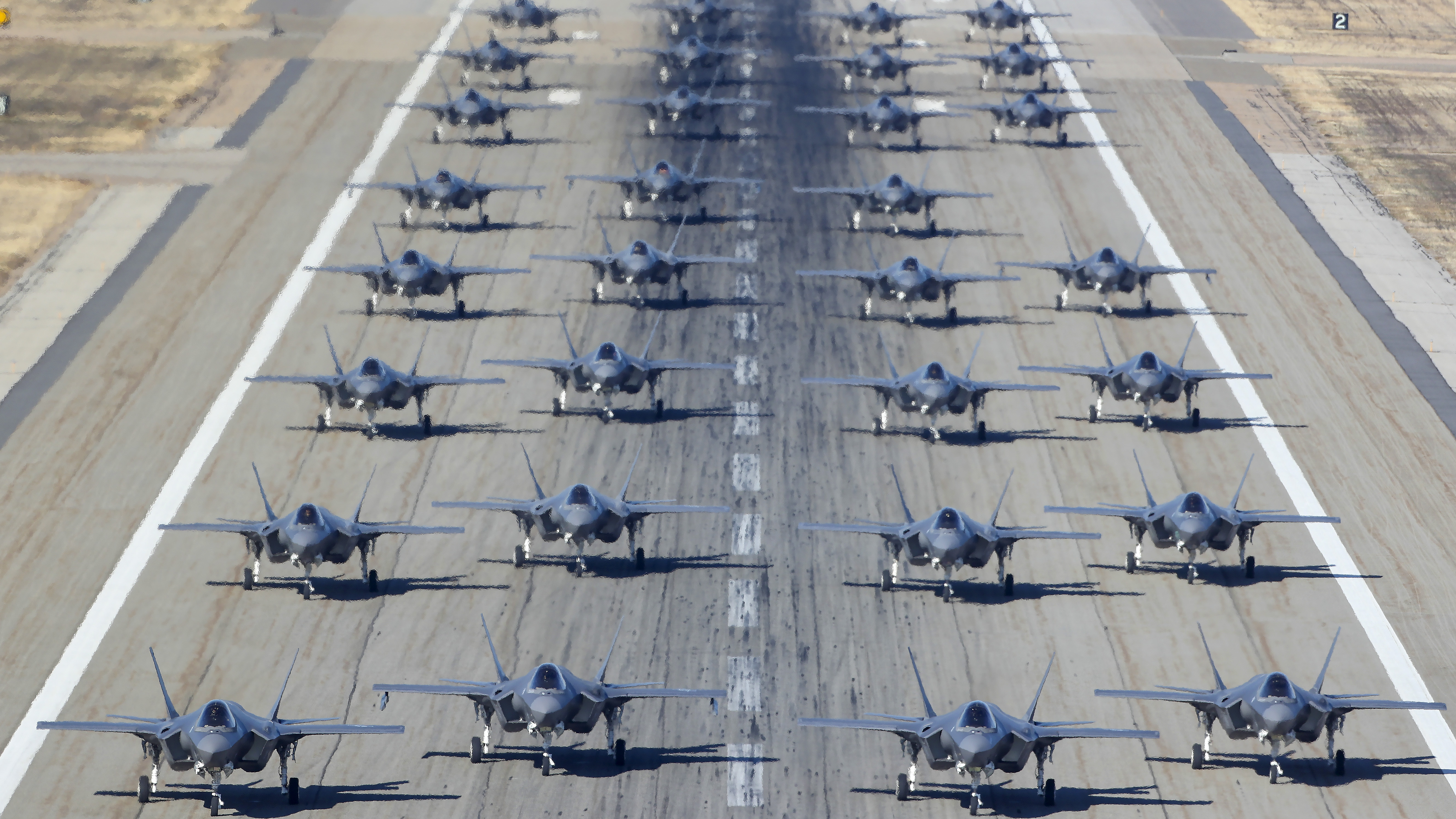 Hill Air Force Bases 388th and 419th fighter wings line up 36, F-35A's on the runway to prepare for take-off on November 19, 2018 in Hill Air Force Base, Utah. This combat training exercise is to help the 388th and 419th, the only combat ready units for the F-35A's, to be ready to launch multiple aircraft on short notice in the defense of the country. (Photo by George Frey/Getty Images)