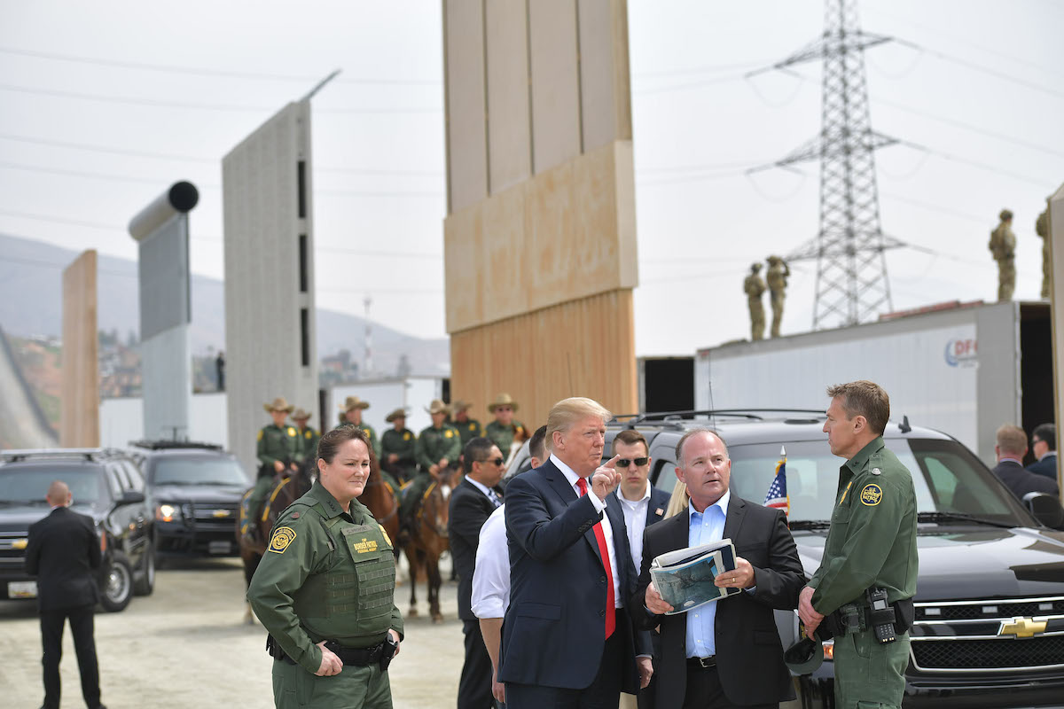 US President Donald Trump inspects border wall prototypes in San Diego, California on March 13, 2018. (Mandel Ngan/AFP via Getty Images)