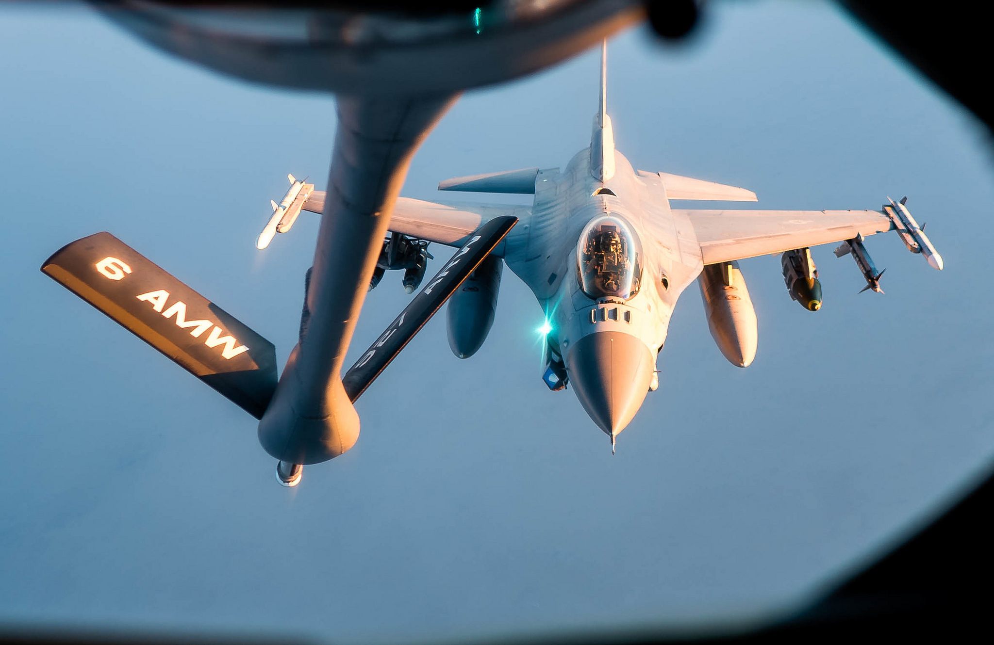 A 28th Expeditionary Aerial Refueling Squadron KC-135 Stratotanker refuels an Air Force F-16 Fighting Falcon in support of Operation Inherent Resolve, Nov. 29, 2018. (Staff Sgt. James Cason/Air Force)
