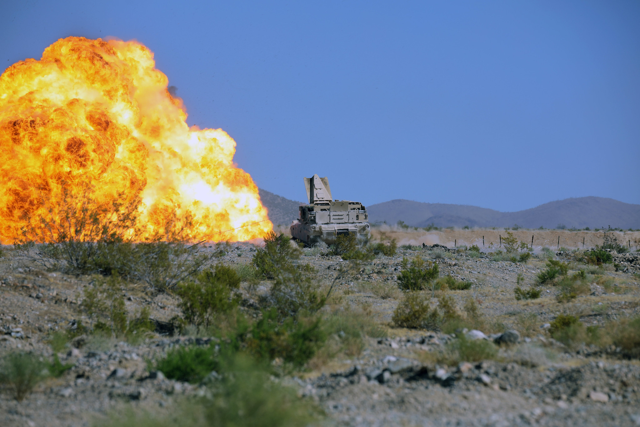 Soldiers detonate C4 from an Armored Breaching Vehicle while conducting a mine clearing line charge live-fire during their 19-09 rotation on July 17, 2019, at the National Training Center at Fort Irwin, Calif. (Staff Sgt. Leticia Samuels/Army National Guard)
