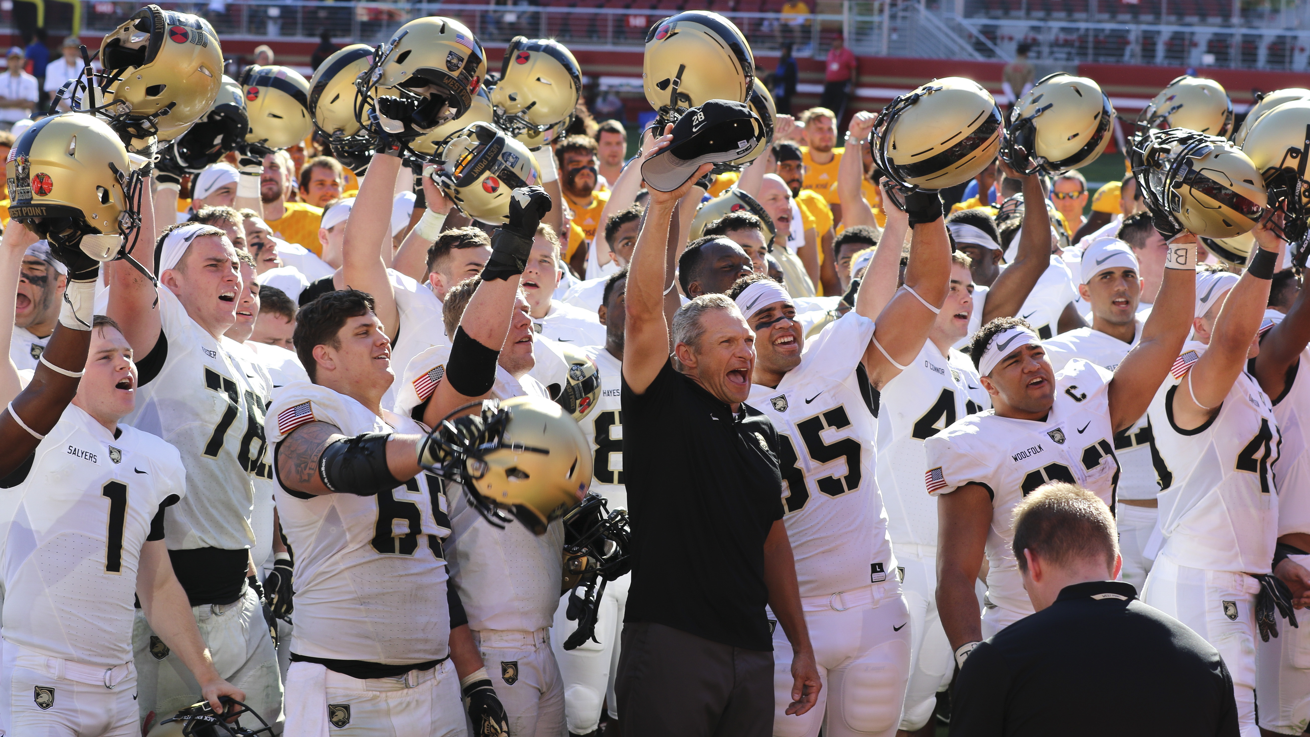 Army West Point football coach Jeff Monken leads the Army football team as they