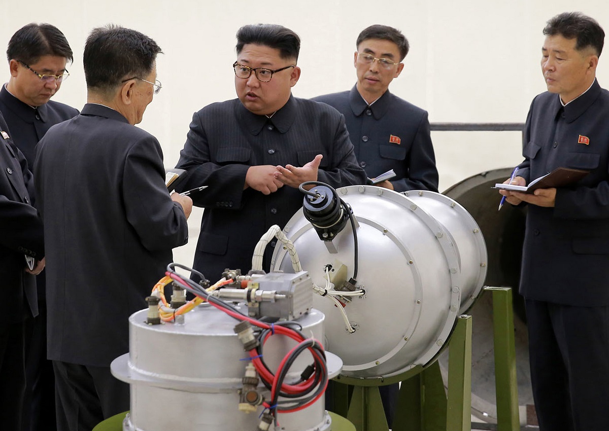 FILE - In this undated file image distributed on Sept. 3, 2017, by the North Korean government, shows North Korean leader Kim Jong Un, center, at an undisclosed location in North Korea. The stakes will be high when North Korean leader Kim Jong Un and South Korean President Moon Jae-in sit down Friday, April 27, 2018 in the no man’s land that forms the world’s most heavily armed border. (Korean Central News Agency/Korea News Service via AP, File)