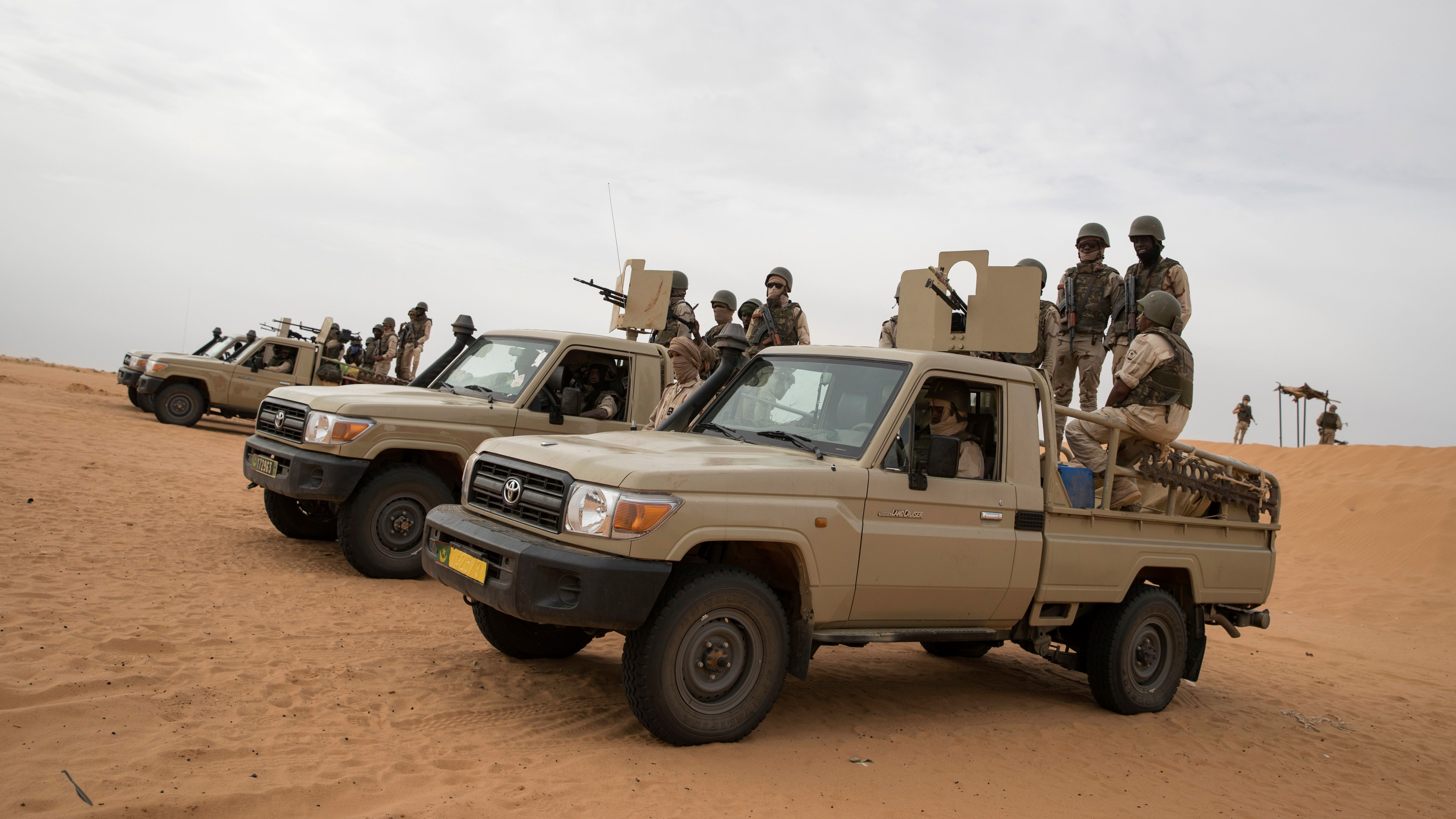 Soldiers of the Mauritania Army wait in armed vehicles at a G5 Sahel task force outpost in the southeast of Mauritania, along the border with Mali, on November 22, 2018. (THOMAS SAMSON/AFP/Getty Images)