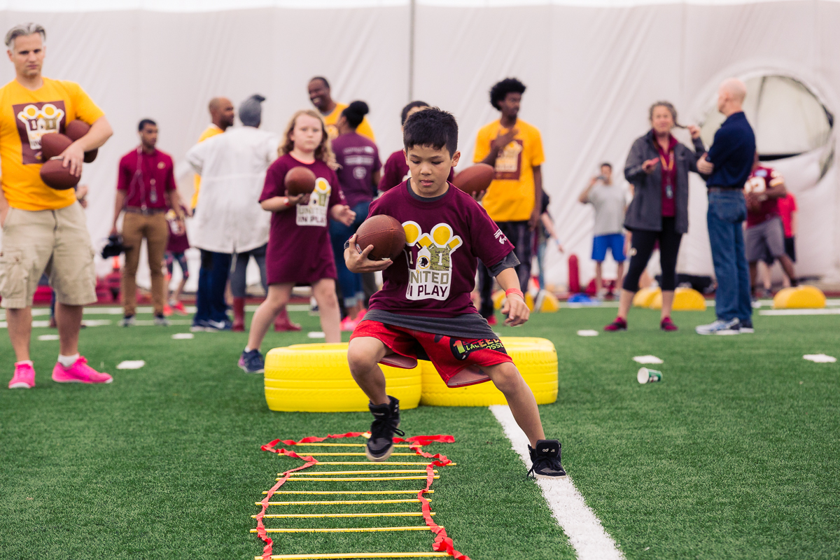 Military children participate in team-building activities for Army Forces Day on Saturday, June 19, 2018, at Redskins Park in Loudoun County, Va. (James Williams/Military Times)