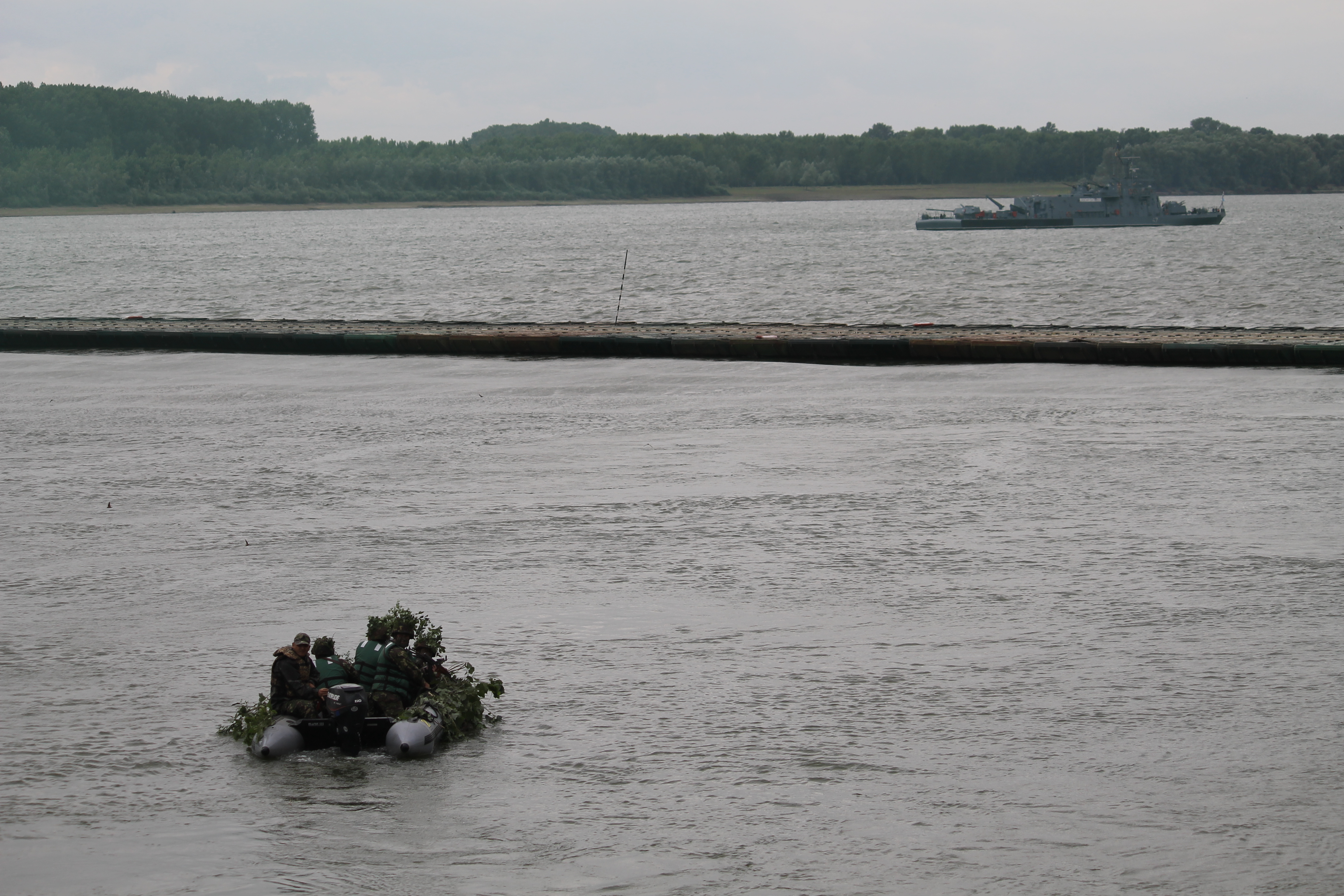 The river crossing exercise was a solid example of a multidomain battle, U.S. Army Europe Commander Lt. Gen. Ben Hodges said following the event. While fighter jets flew overhead, combat vehicles and short-range air defense systems fired on the shores, and rafts zipped back and forth, carrying troops across the Danube. Several river flotilla from the Romanian Navy were positioned to protect the bridge and the shores. (Jen Judson/Staff)