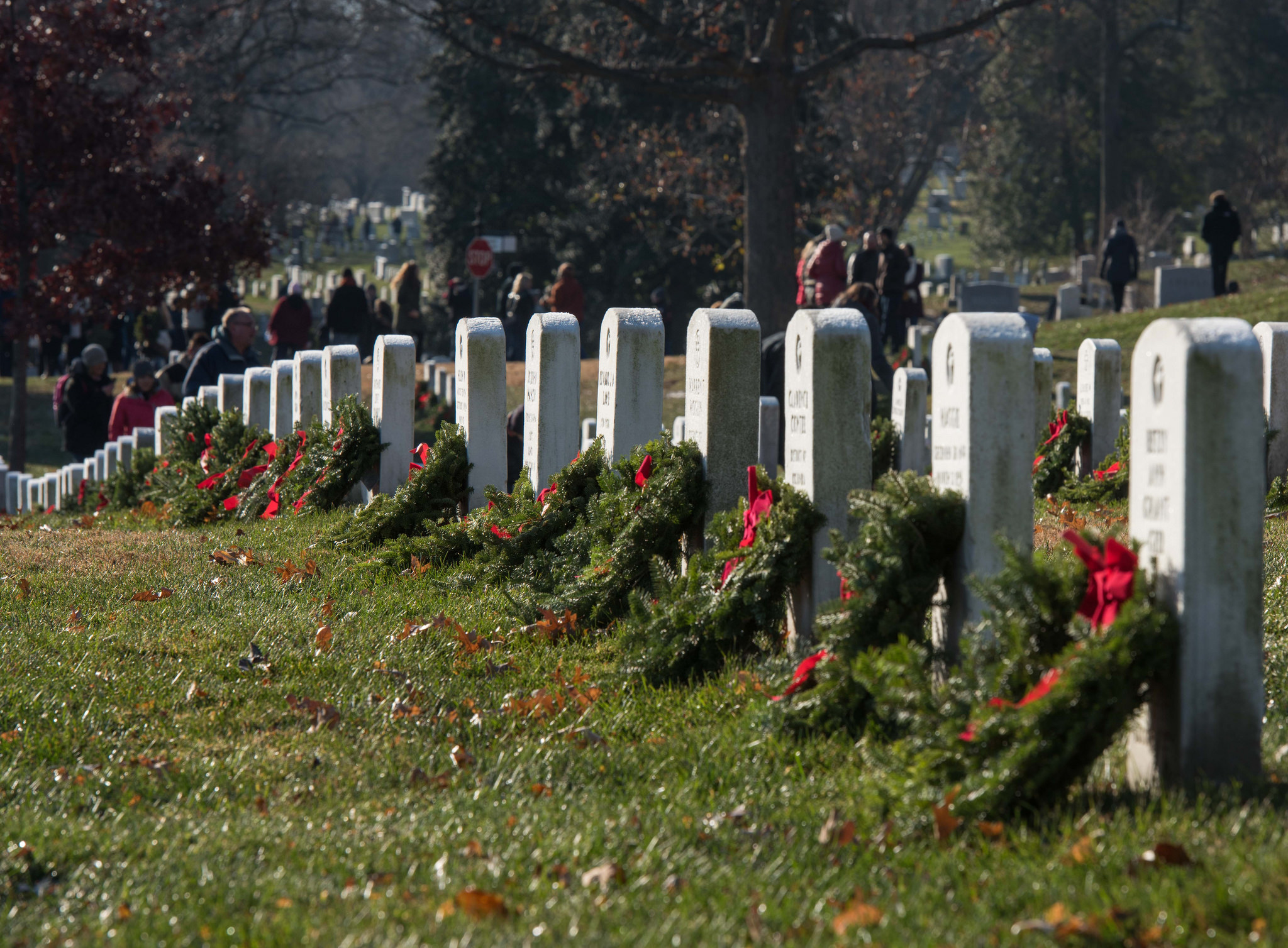 Service members and volunteers participate in Wreaths Across America at Arlington National Cemetery, Va., Dec. 16, 2017. (Sgt. George Huley/Army)