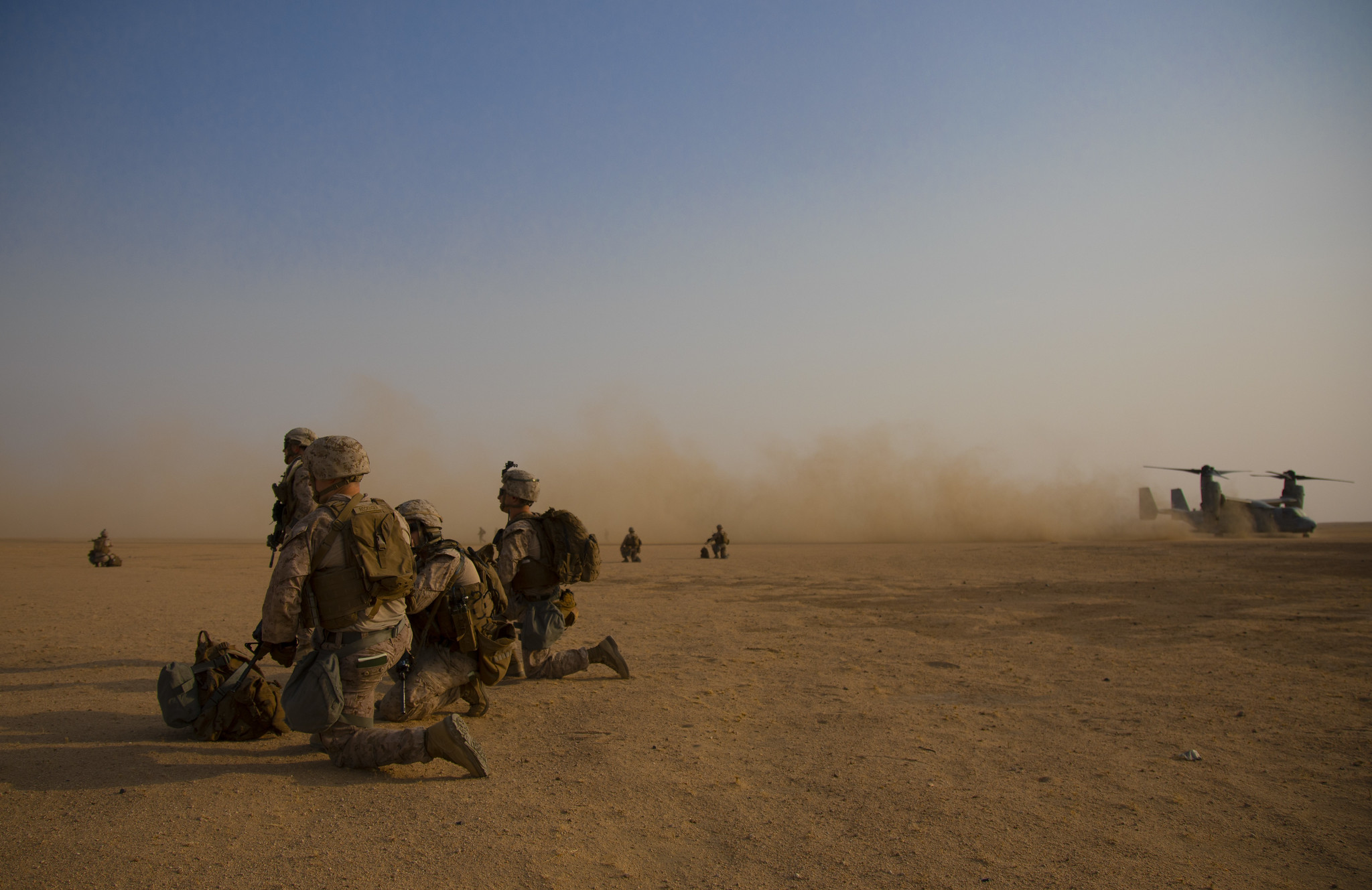 U.S. Marines with 1st Battalion, 7th Marine Regiment, attached to Special Purpose Marine Air-Ground Task Force Crisis Response-Central Command, post security during a tactical recovery of aircraft and personnel exercise at Camp Buehring, Kuwait, Aug. 7, 2019. (Cpl. Miguel A. Rosales/Marine Corps)