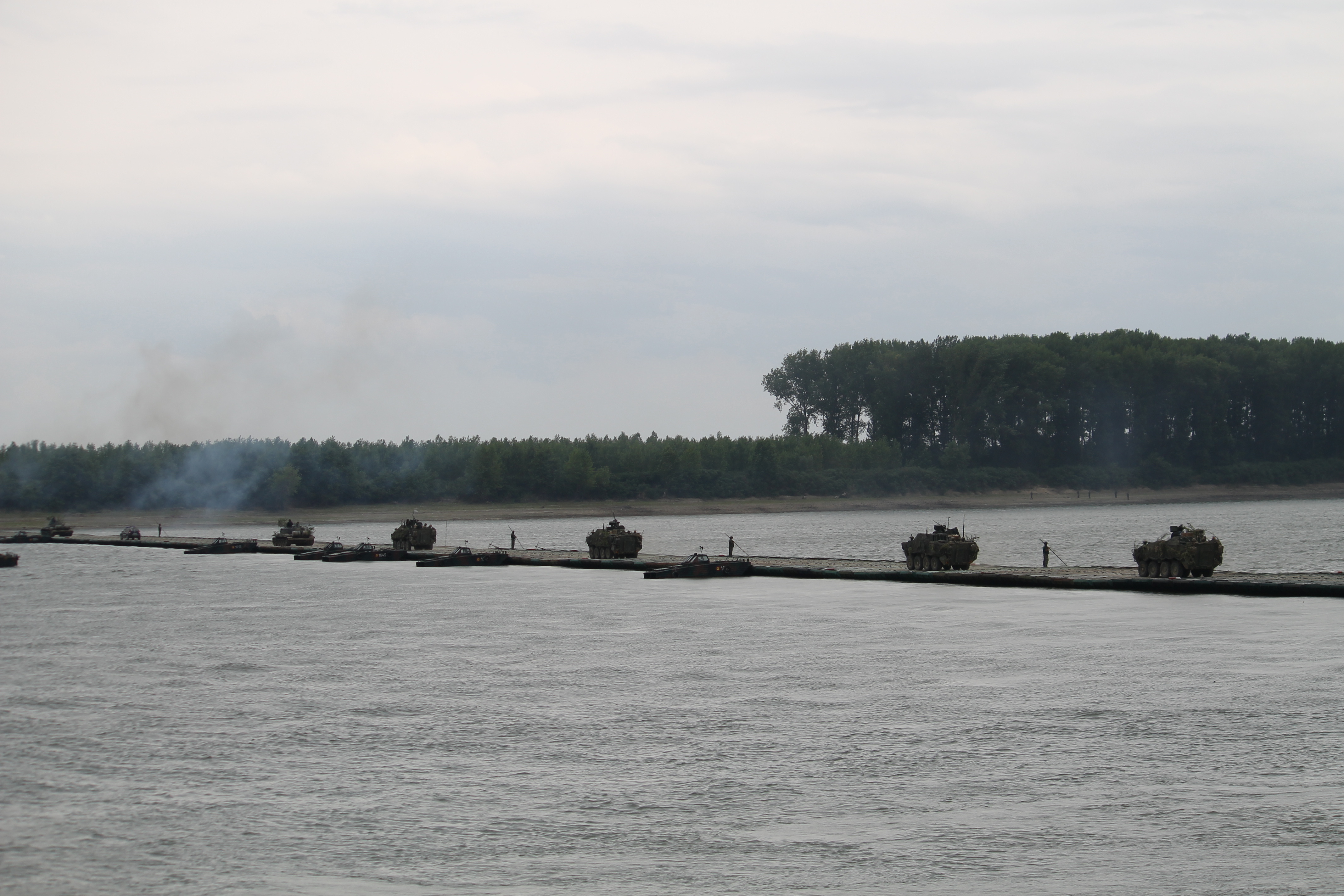 U.S. Strykers move across the Danube. The river is critically important to the region because it serves as a great highway of commerce for many different countries and feeds into the Black Sea. Romanians are concerned about what Russia has done in the Black Sea and Crimea, and they fear further Russian aggression and encroachment in strategically important waterways. (Jen Judson/Staff)