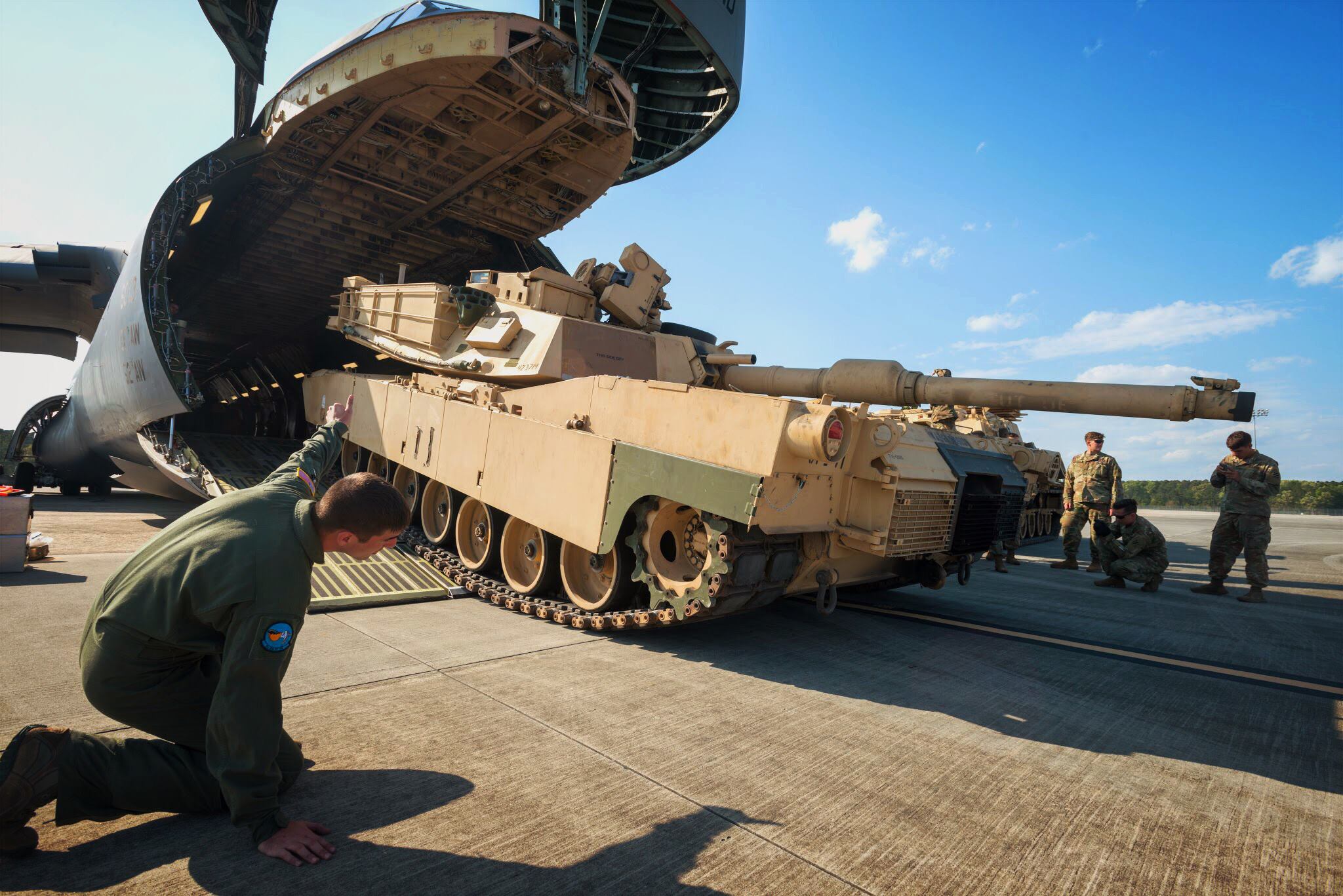 Soldiers of the 2nd Battalion, 7th Infantry Regiment, 1st Armored Brigade Combat Team, 3rd Infantry Division load a M1A1 Abrams tank onto a C5 “Super Galaxy” at Fort Stewart Hunter Army Airfield, Ga. The battalion is rehearsing air load operations for the division’s Immediate Ready Company, responsible to maintaining readiness in support of the Global Response Force mission to deploy within 18 hours of notification. (US Army Photo)
