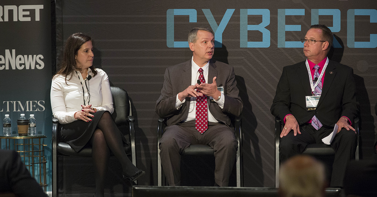 Rep. Elise Stefanik (R-NY) Chair House Armed Services Subcommittee on Emerging Threats and Capabilities, left, David Wallen, Sr. Vice President, Cyber Operations, ManTech International Corp., center, and Dr. George Trawick, Ph.D., Assistant Professor, College of Information and Cyberspace, National Defense University discuss Information Warfare: The Cyber Component during a Panel discussion at Cybercon 2017 at the Ritz-Carlton Hotel in Pentagon City on Nov. 28, 2017. ( Ben Murray/Staff)