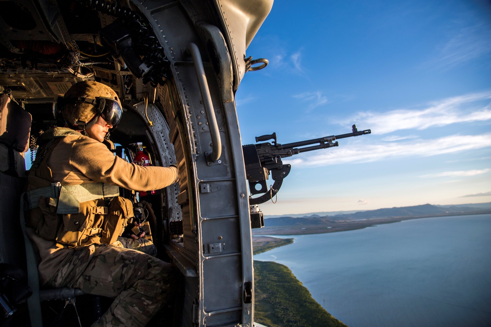 A crew chief scans the skies while on a mission to emplace U.S. and Australian special operations forces during Talisman Sabre, July 12, 2019, in Queensland, Australia. (Lance Cpl. Nicole Rogge/Marine Corps)