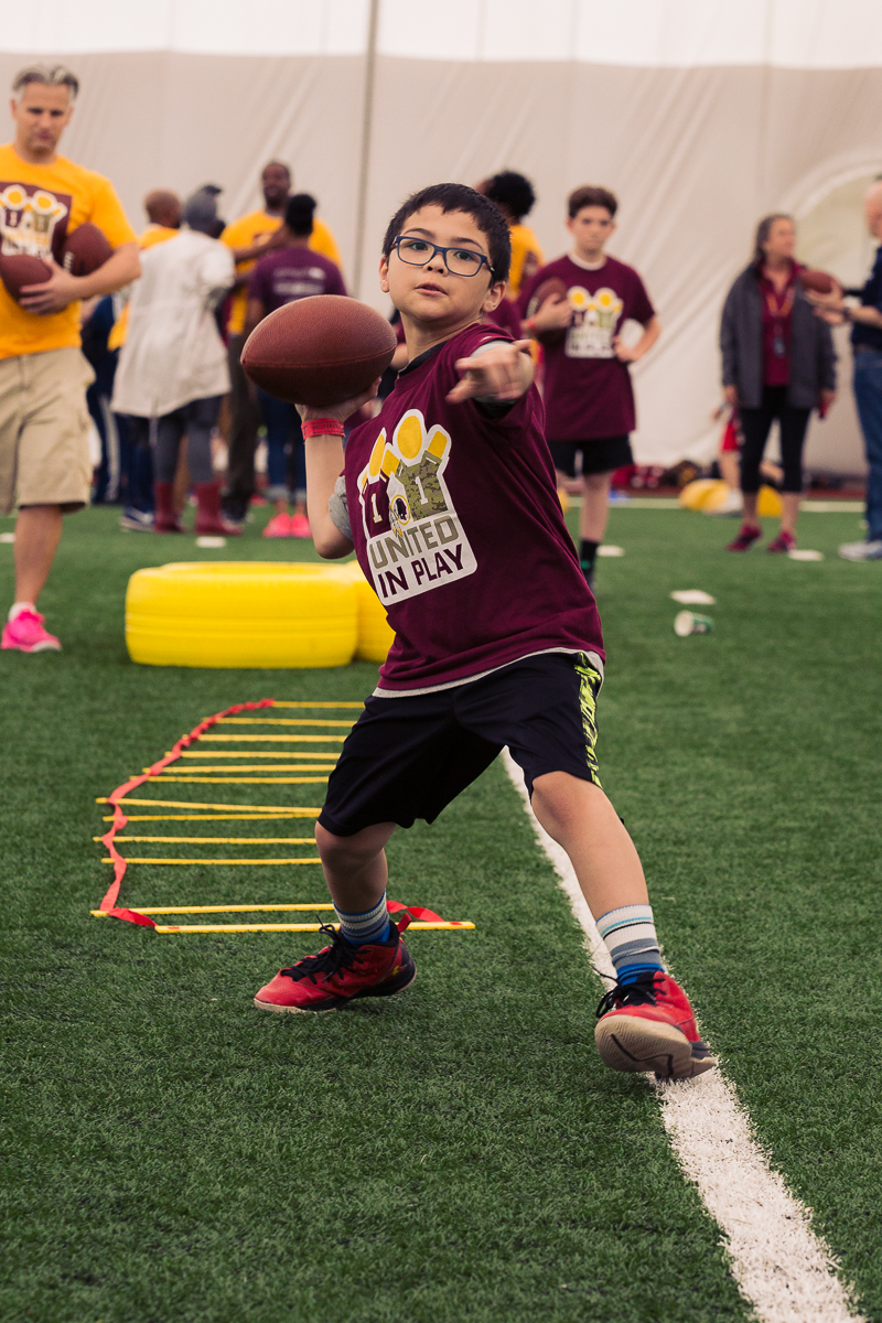 Military children participate in team-building activities for Army Forces Day on Saturday, June 19, 2018, at Redskins Park in Loudoun County, Va. (James Williams/Military Times)
