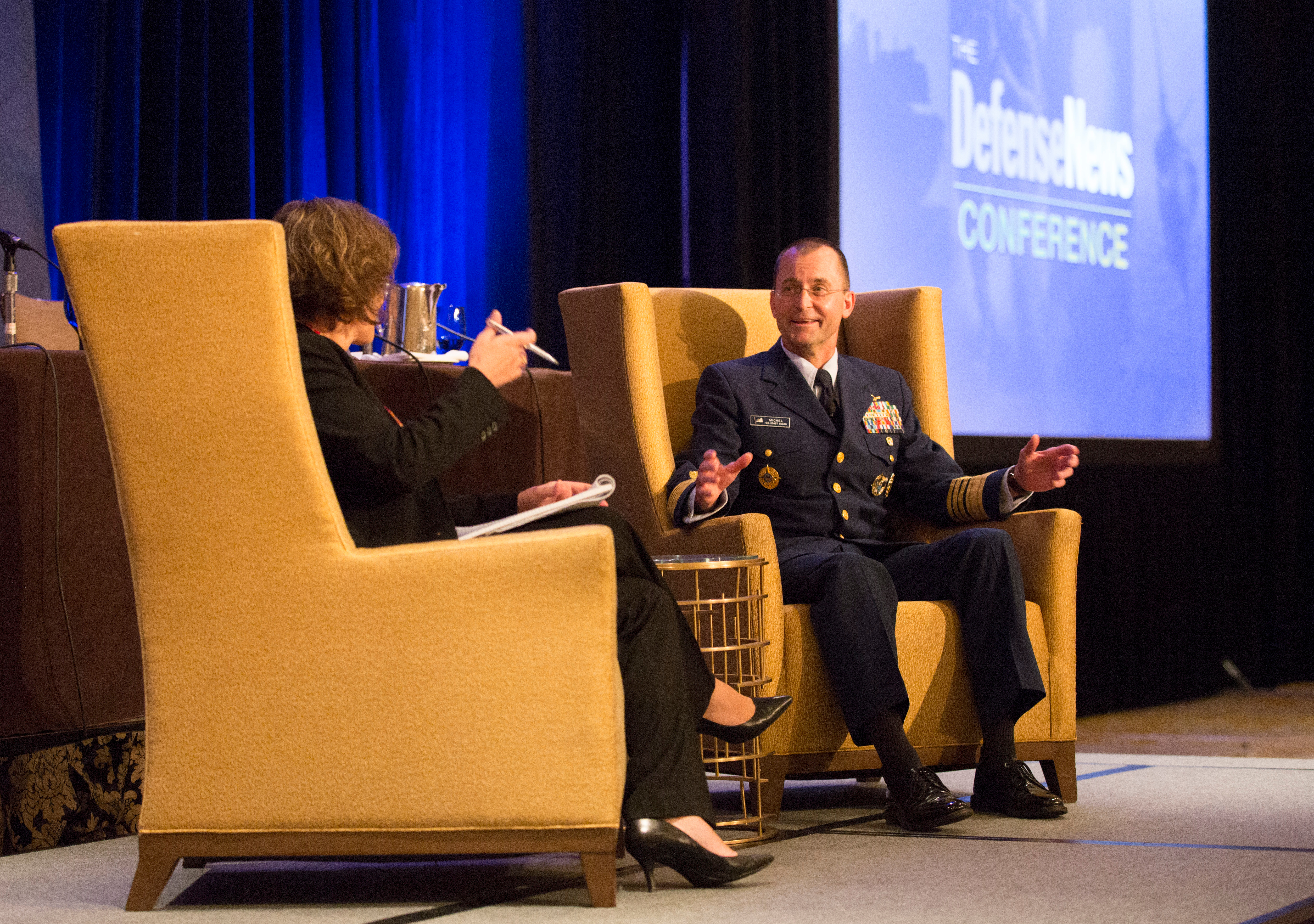 Adm. Charles Michel, right, vice commandant of the U.S. Coast Guard, participates in a fireside chat with Defense News Executive Editor Jill Aitoro during the Defense News Conference in Pentagon City, Va., on Sept. 6, 2017. (Amber Corrin/Staff)